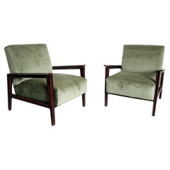 Set of two Mid Century Modern armchairs in walnut and green velvet upholstery