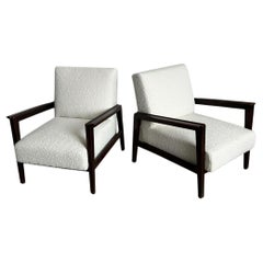 Set of two Mid Century Modern armchairs in walnut and white boucle upholstery