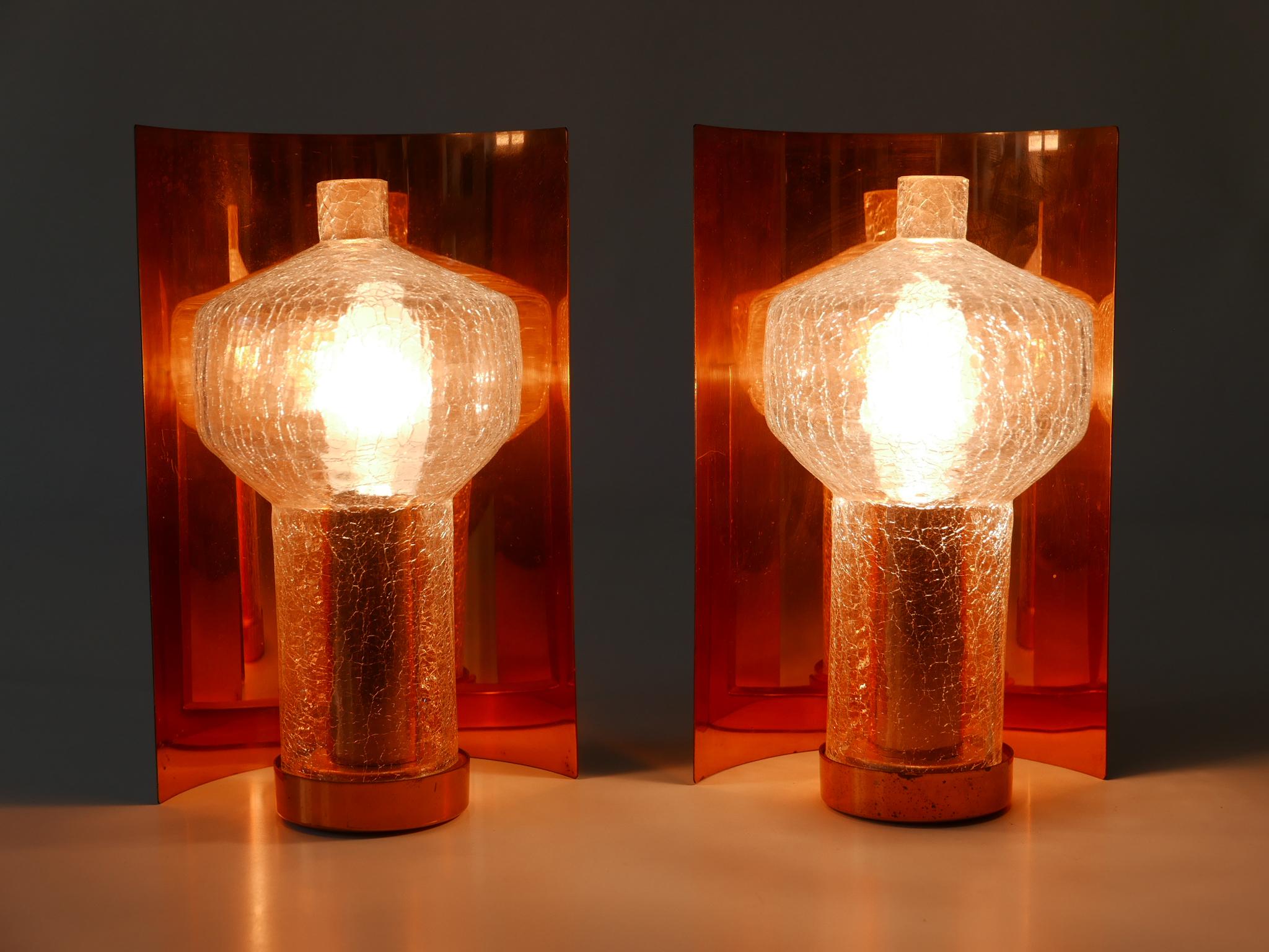 Set of two rare and elegant Mid-Century Modern sconces. Designed & manufactured by Kaiser Leuchten, Germany, 1960s.

Executed in copper and handblown craquelé glass, each lamp comes with 1 x E14 / E12 Edison screw fit bulb holder, is wired, in