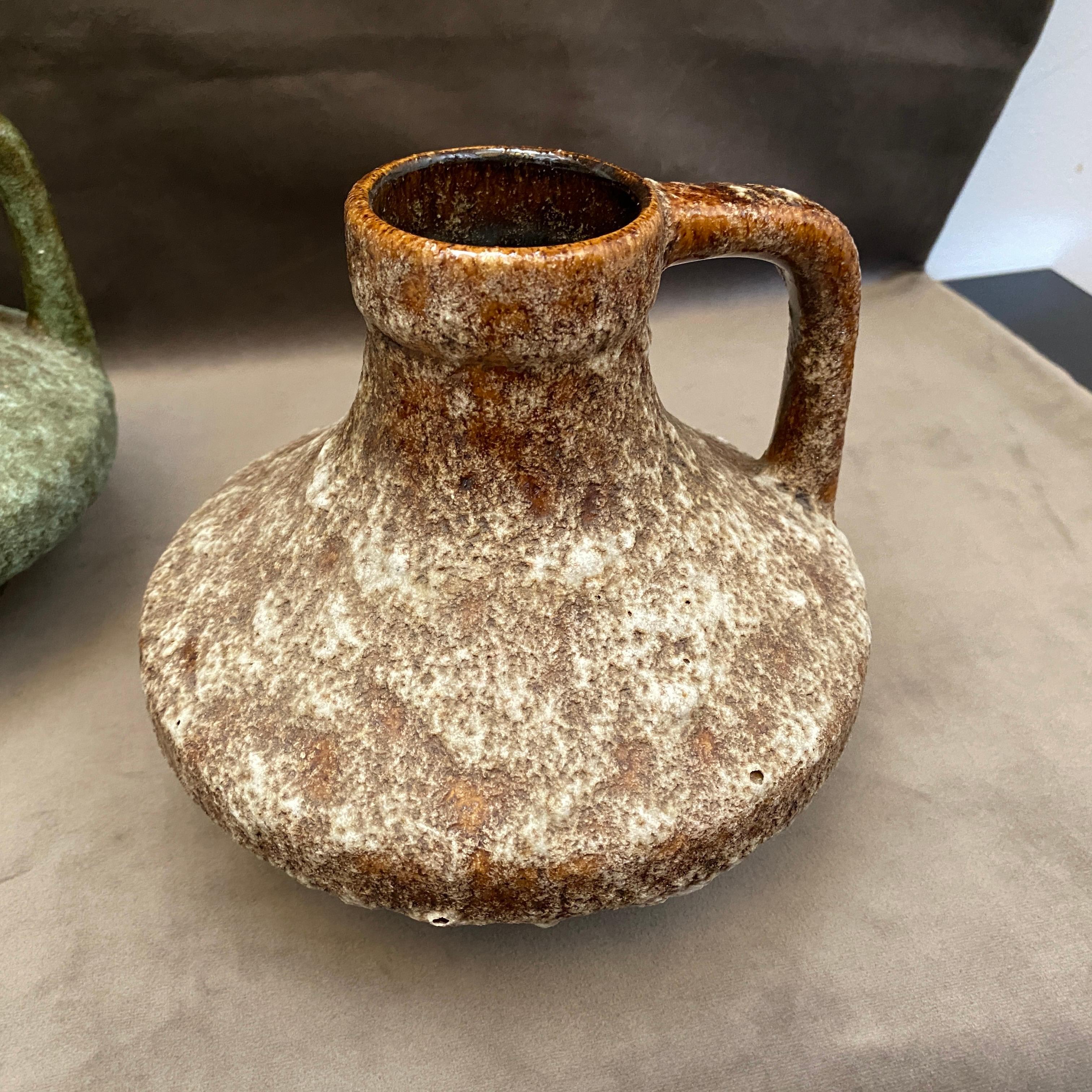 Two fat lava ceramic jugs designed by Heinz Martin in the 1970s and manufactured by ES keramik, they are in perfect conditions.