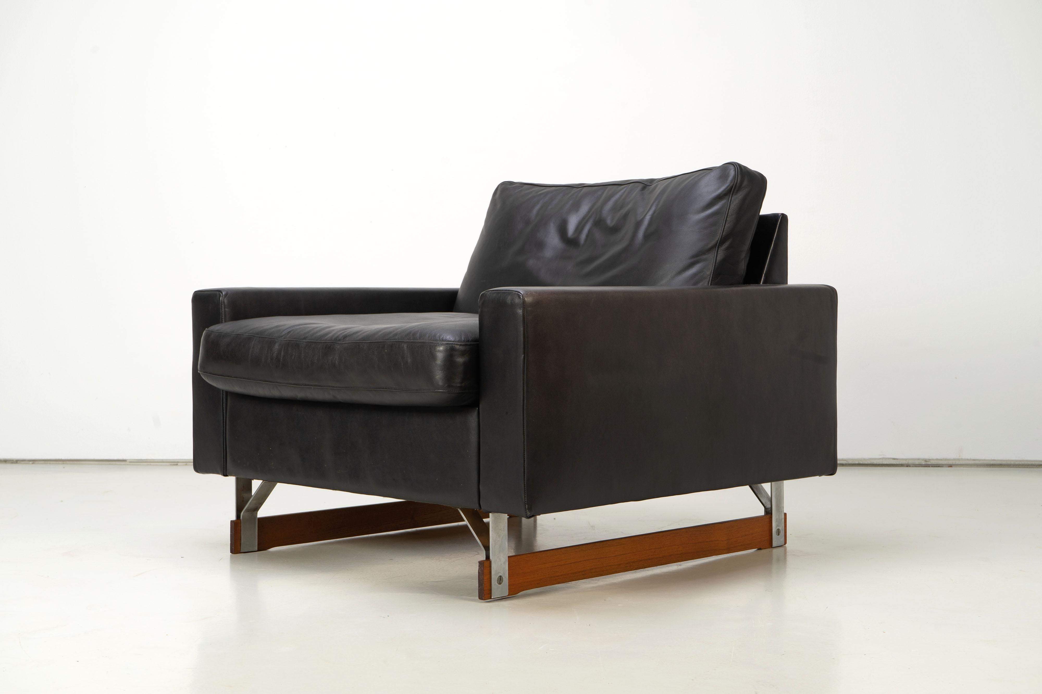 European Set of Two Mid-Century Modern Leather Club Chairs with Wooden Sleds, 1960s For Sale