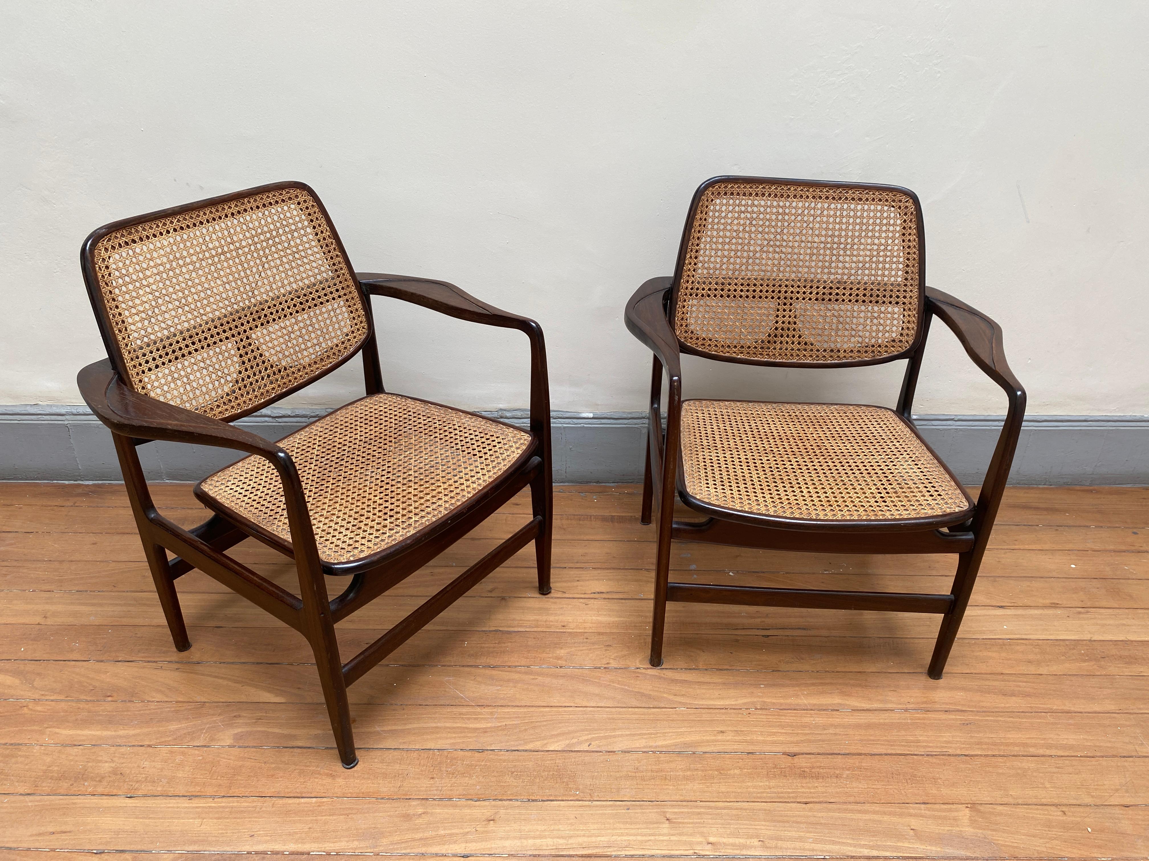 Set of Two Mid-Century Modern Oscar Armchairs by Sergio Rodrigues, Brazil, 1956

Named after Oscar Niemeyer, this armchair features the iconic curves and sinuous lines characteristic of the work of the famous Brazilian architect. 
Designed in 1956