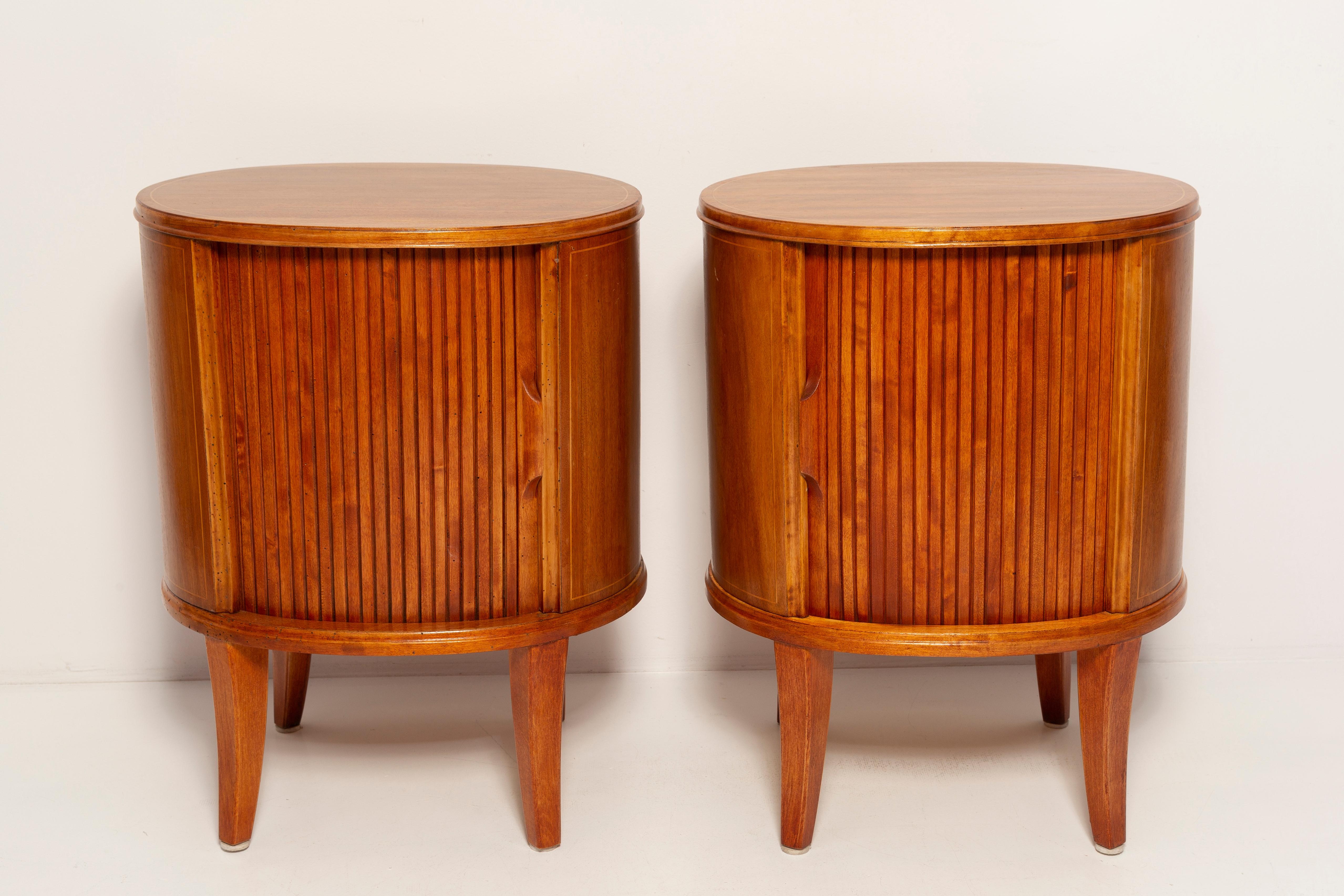 Set of two bedroom night tables from the 1960s. It was manufactured in Poland. They was made of wood, it was refreshed and fully renovated.
Very good vintage condition.