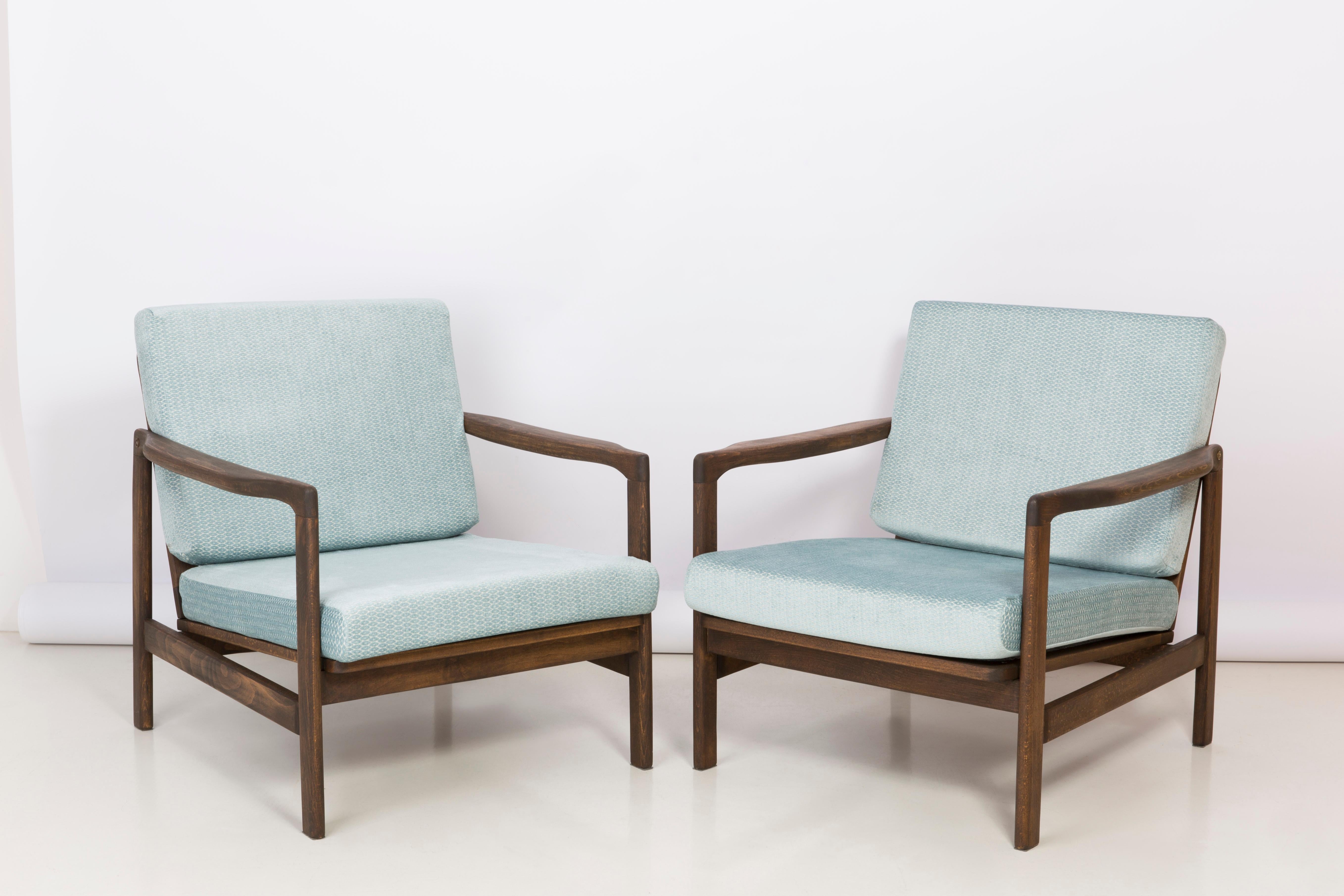 The B-7522 armchairs was designed in the 1960s by Zenon Baczyk, it was produced by Swarzedz furniture factories in Poland. Furniture kept in perfect condition, after full upholstery and wood renovation. Stabile and very comfortable armchair, dressed