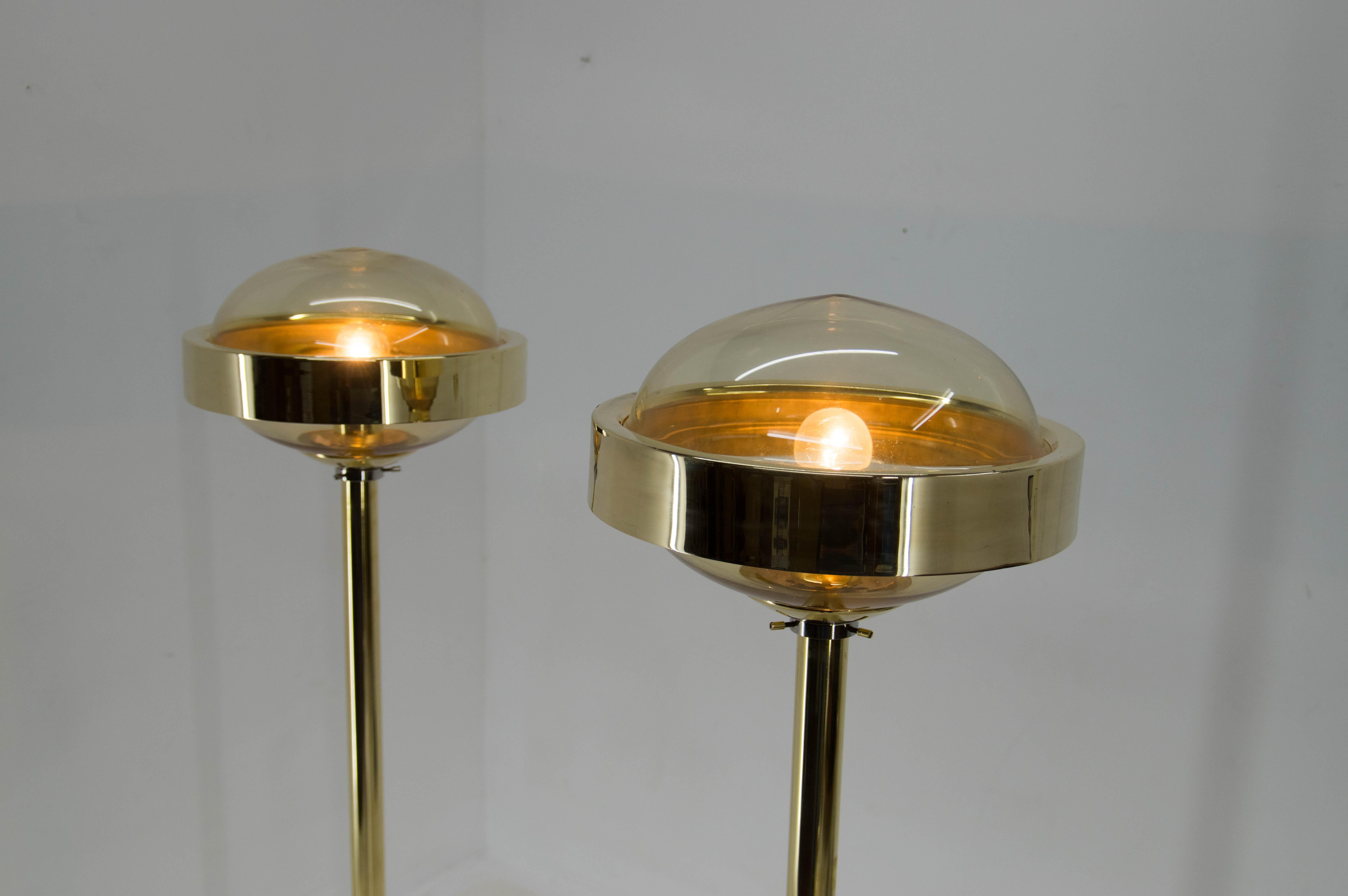 Set of two floor lamps made of brass and smoke glass. 
Made by Preciosa, Kamenicky Senov in Czechoslovakia in 1970s
Restored: brass carefully polished
Rewired: 1x60W, E25-E27 bulb
US plug adapters included.
   