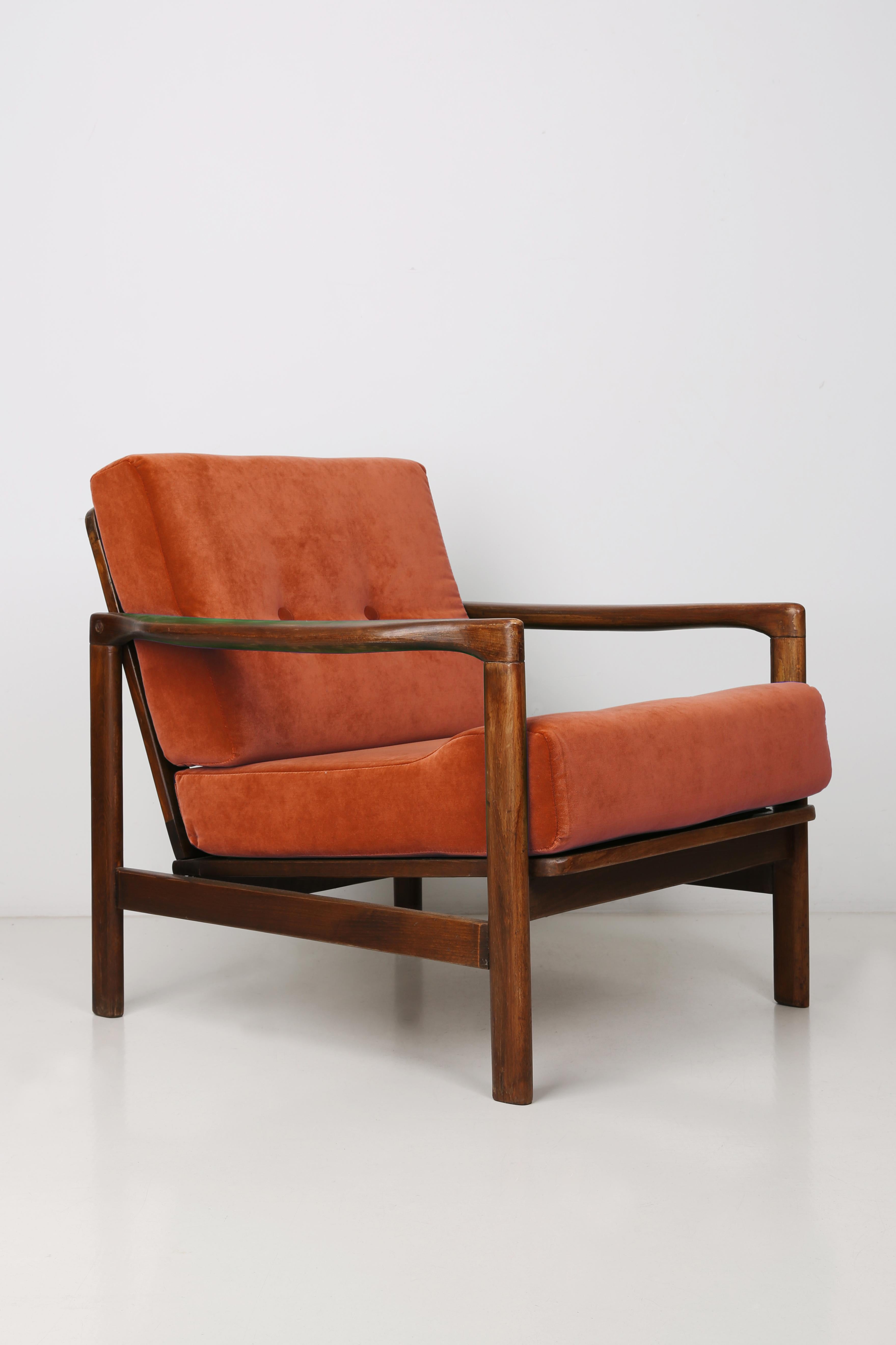 The B-7522 armchairs was designed in the 1960s by Zenon Baczyk, it was produced by Swarzedz Furniture Factories in Poland. Furniture kept in perfect condition, after full upholstery and wood renovation. Stabile and very comfortable armchair, dressed