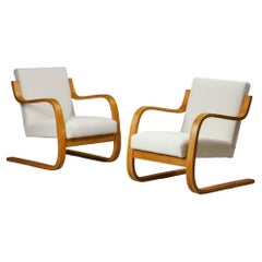 Ensemble de deux fauteuils luge modèle 402 par Alvar Aalto+Aalto pour Artek, années 1950