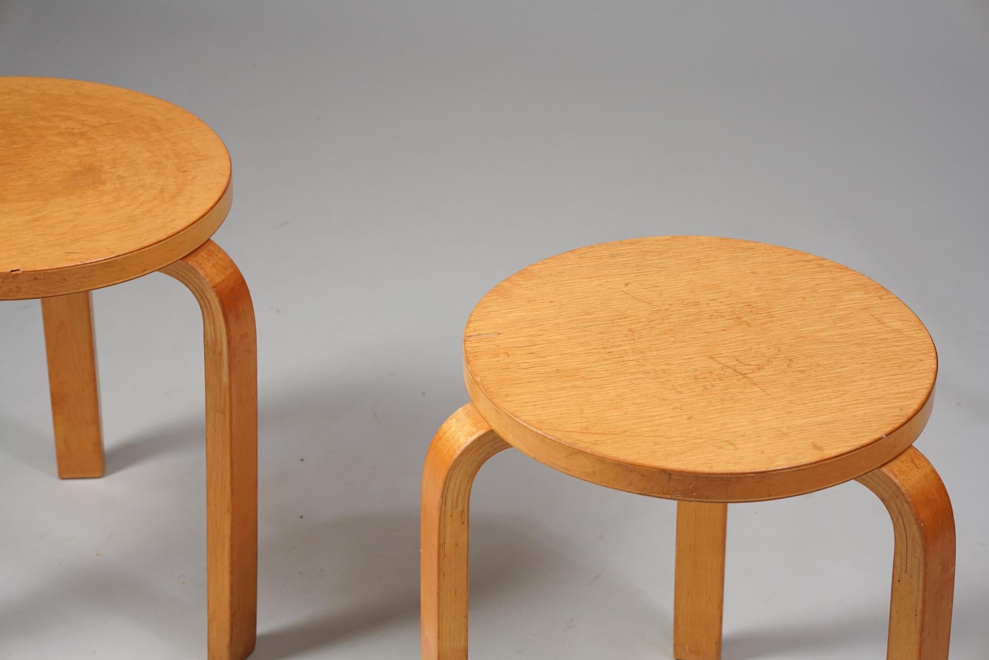 Set of two model 60 stools, design Alvar Aalto for Huonekalu- ja Rakennustyötehdas Oy from the 1930s, Birch. Good vintage condition, patina and wear consistent with age and use. Iconic Alvar Aalto design. Stools are sold as a set.