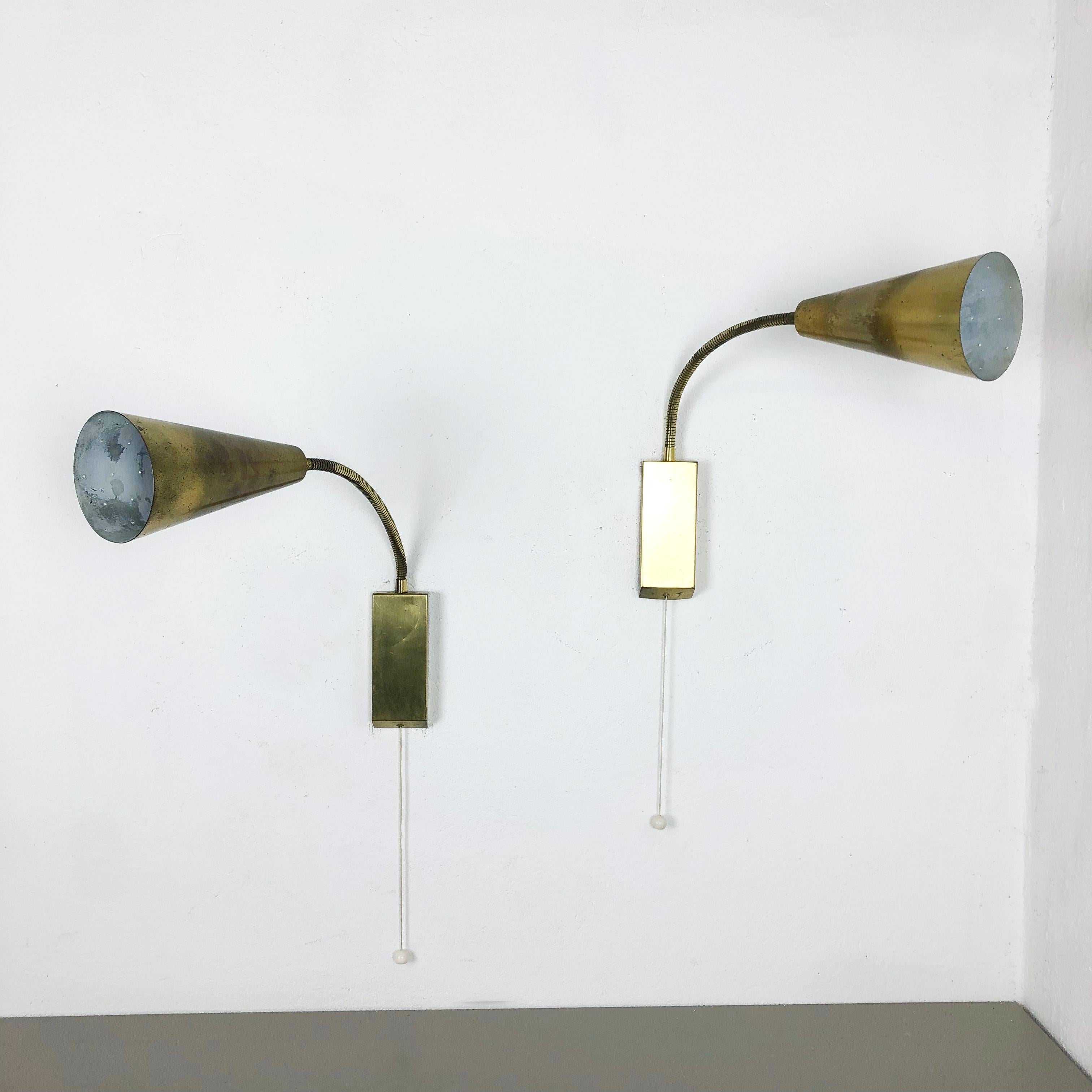 Article:

Brass wall lights sconces, set of two



Origin:

Italy



Age:

1950s




This set of two vintage modernist wall lights was produced in the 1950s in italy. The lights are made of metal and solid brass. due to the