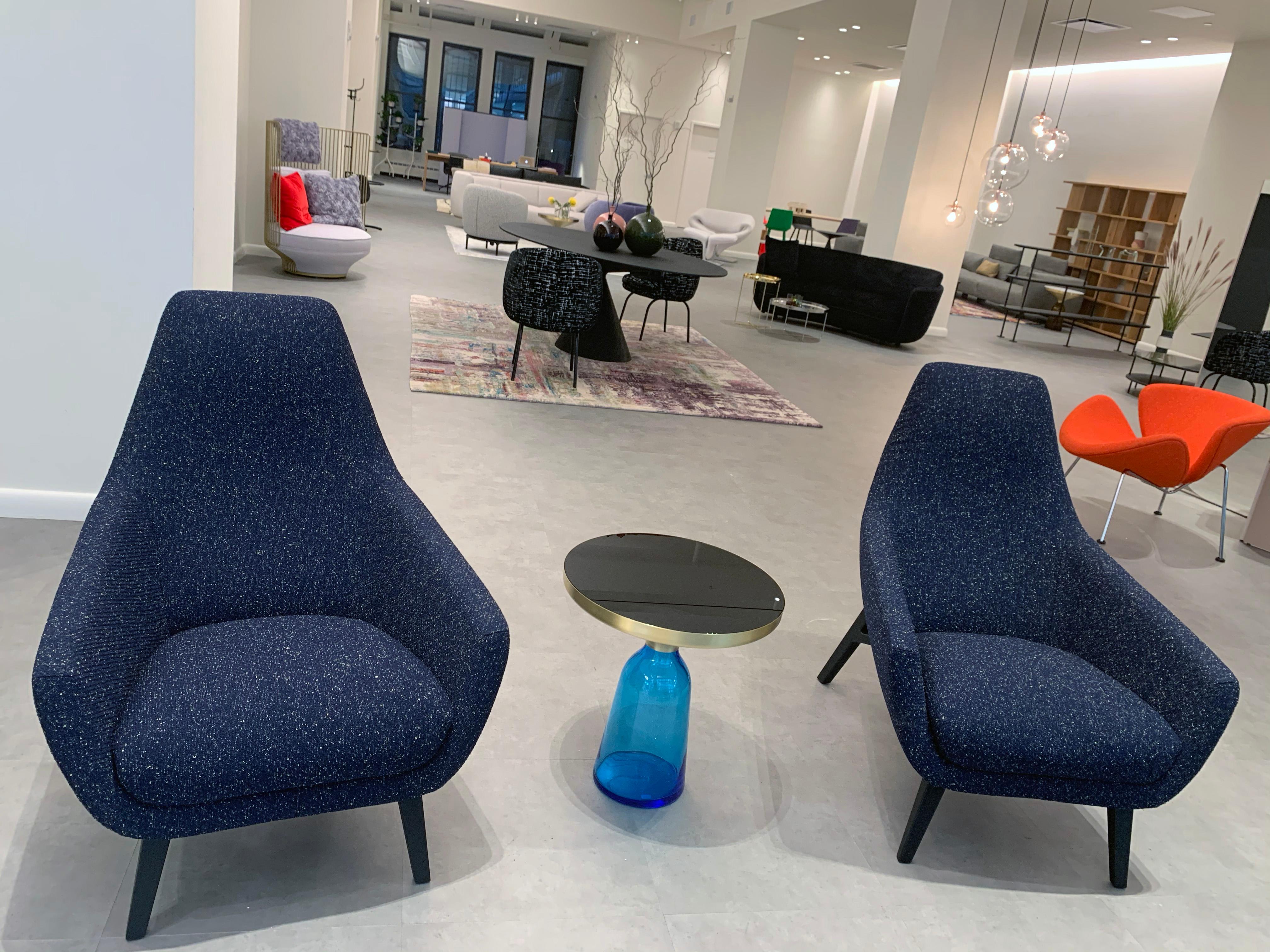 Brand new Enzo lounge chair
The actual color of the fabric is dark blue (see second image)
Upholstered in Kvadrat Pilot by Raf Simons Fabric color #792
Oak legs: black carbon lacquered
Enzo is a comfortable and inviting armchair that is