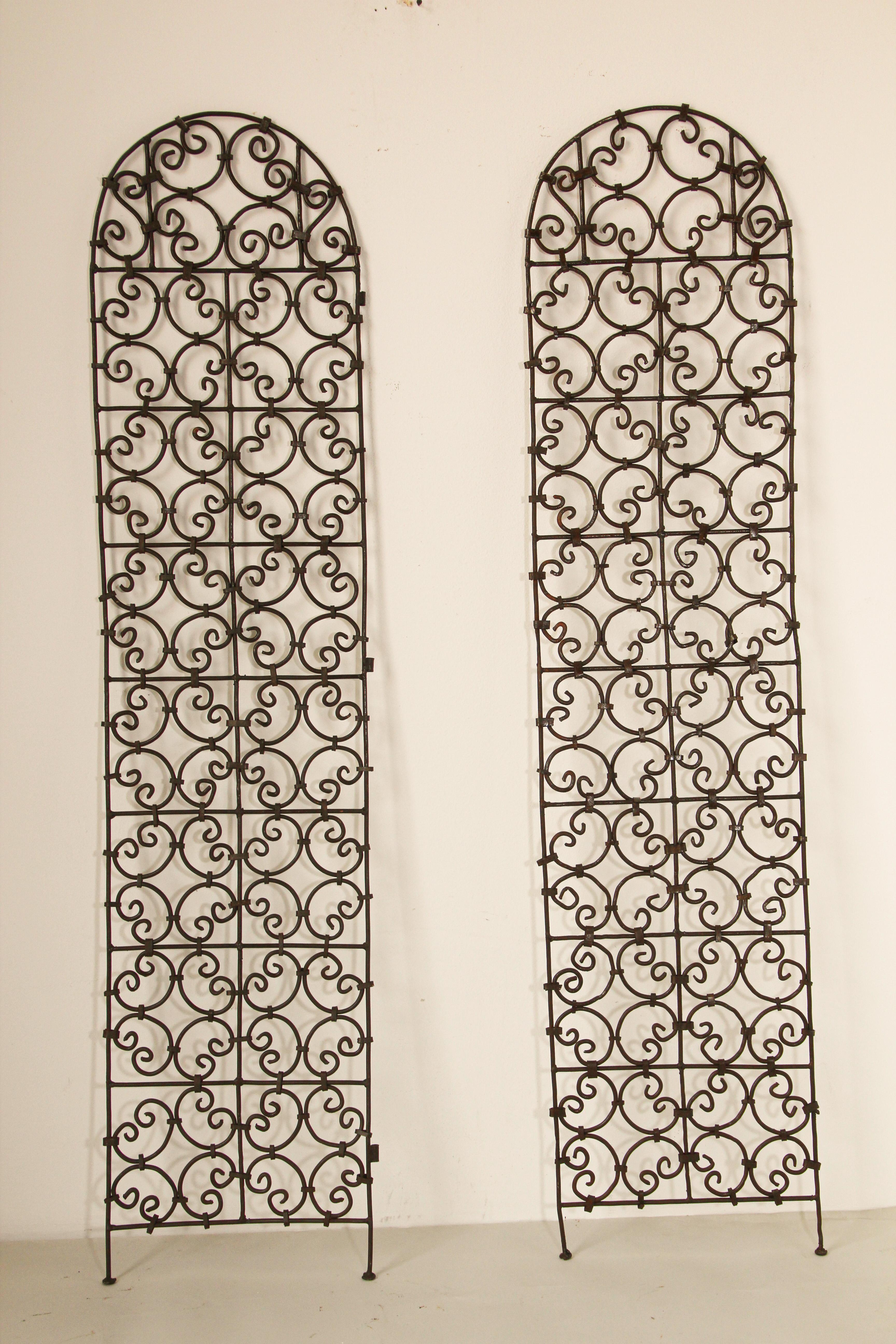 Set of two Moorish screen hand forged iron panels
Hand forged folding Moroccan screen panels decorated with Moorish designs.
Classic and elegant Art & Craft this highly embellished, detailed folding screen divider in the Mediterranean Spanish style