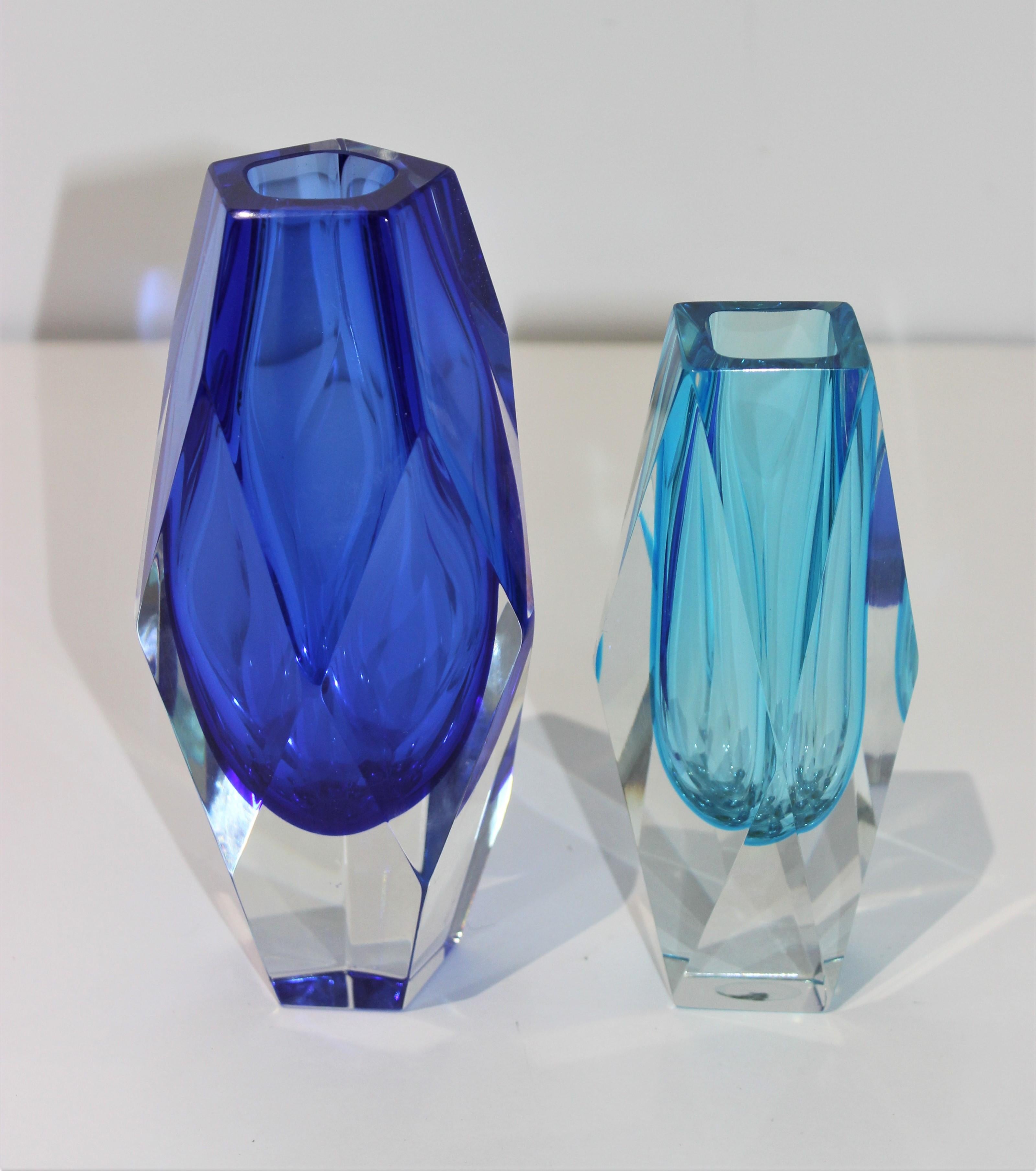 The stylish two piece set of Murano glass vases date to the 1970s and were created by Artistic Cristal. 

Note: The shorter vase retains its original label on the verso (see photo), and the taller has no label.

Note: Taller vase dimensions are