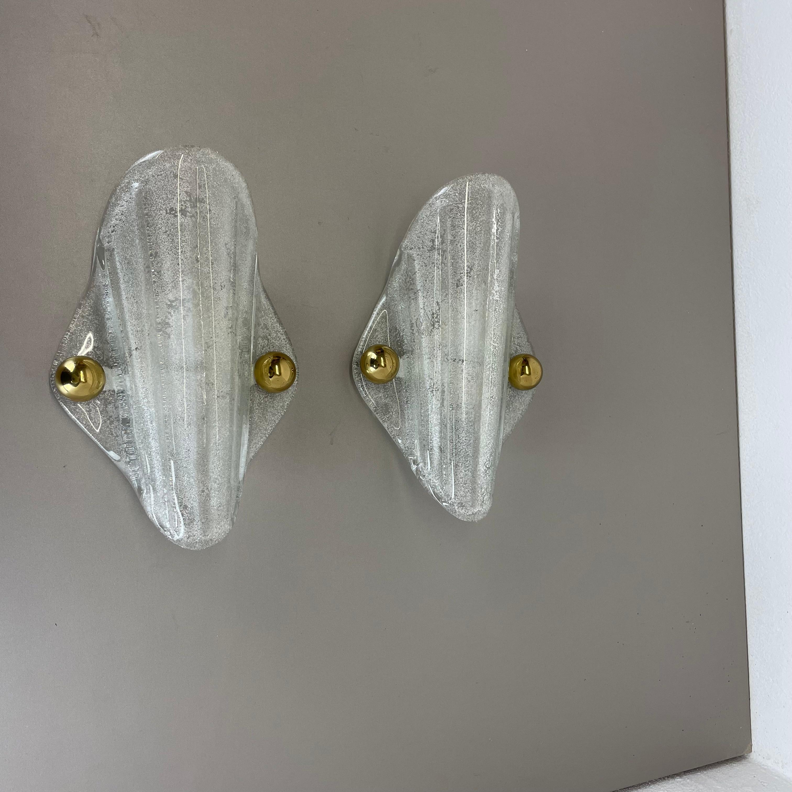 Article:

Set of two

Wall light sconces


Origin:

Germany


Producer:

Hillebrand Leuchten, Germany



Age:

1970s



This set of two modernist lights was produced in Germany in the 1970s. It is made from heavy italian