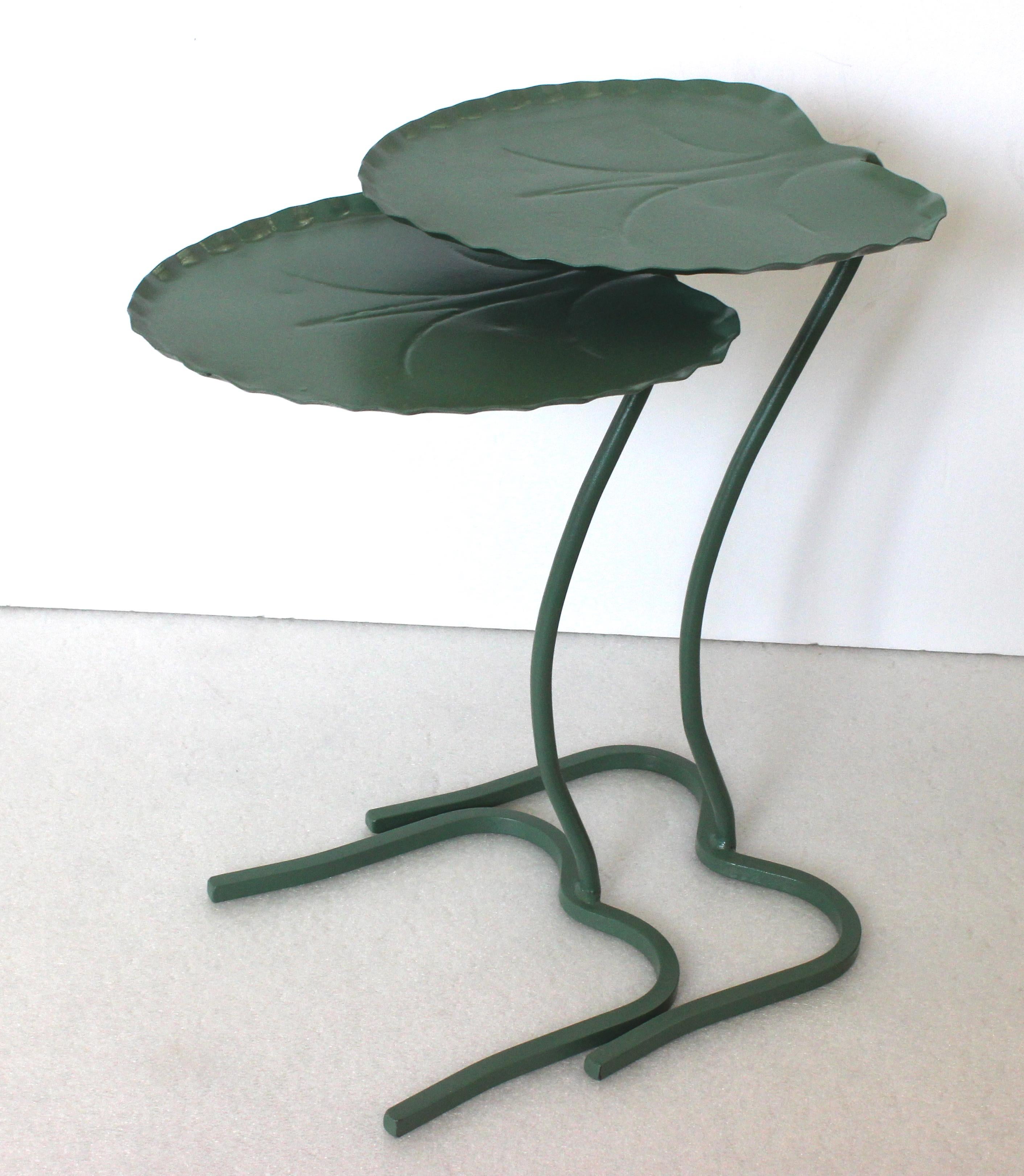 This stylish two-piece set of lily pad tables date to the 1960s-1970s and were created by Salterini. 

Note: Dimensions of the tables are...taller one 20.25