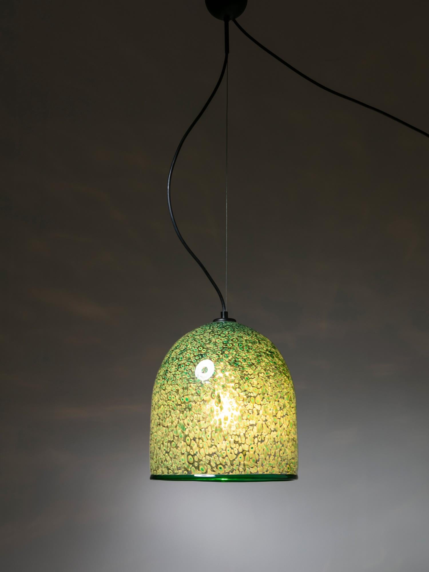 Pair of Neverrino ceiling lamps by Luciano Vistosi for Vistosi.
Different sizes and same green tone glass dome revealing the amazing Murrine pattern when switched on.
This design is often attributed to Gae Aulenti.
Size refers to the largest