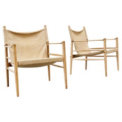 Set of two oak and linnen safari chairs