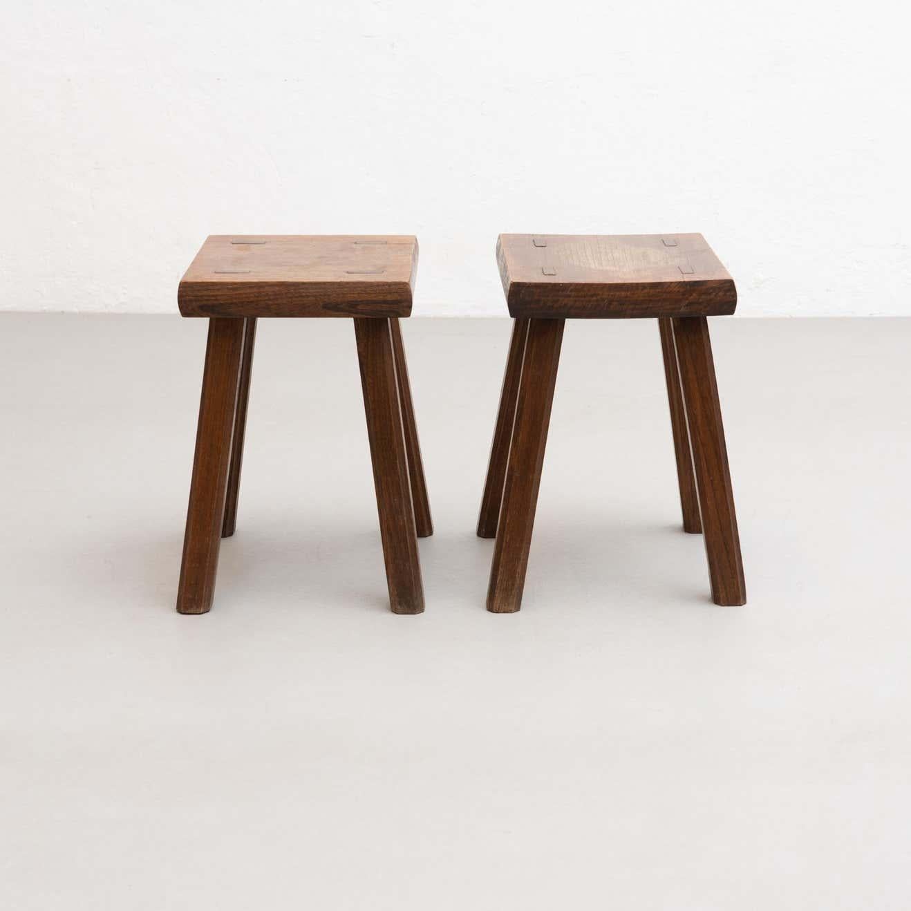 Set of two oak wood stools in style of Pierre Chapo.

Manufactured in France, circa 1960.

Material:
Solid oakwood.

Pierre Chapo is born in a family of craftsmen. After his regular studies, he worked in the workshop of a navy carpenter. He was