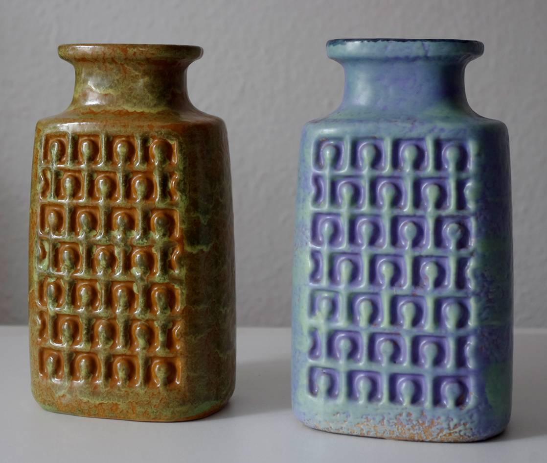 Pair of beautiful Mid-Century Modern vases with a geometric relief décor.
Germany, 1960s.
 