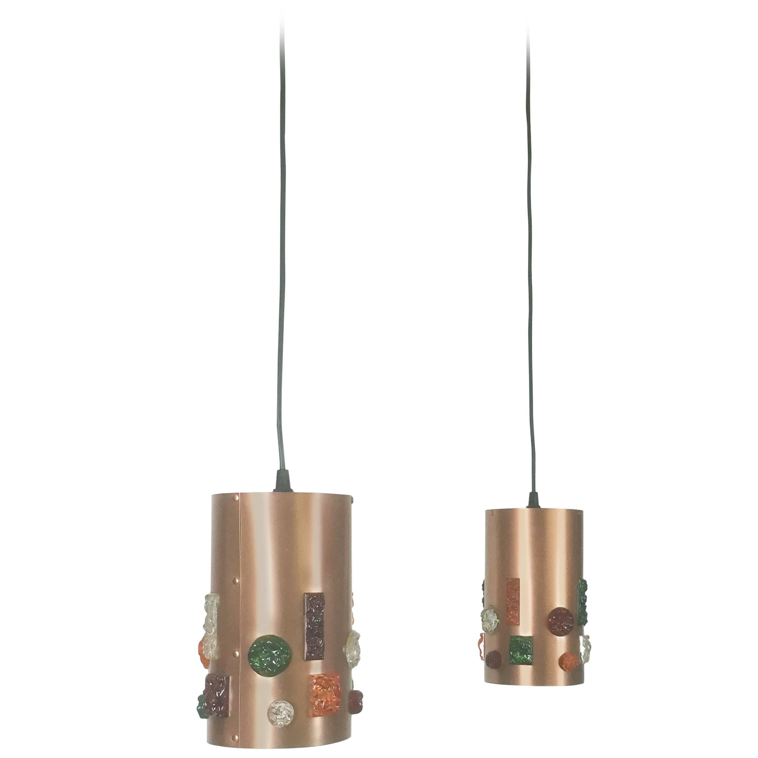 Article: hanging light set of two



Origin: Germany


Age: 1970s 


Description: 

This fantastic set of two hanging lights was designed and produced in 1970s in Germany. the two shades are made of thin copper and do have several
