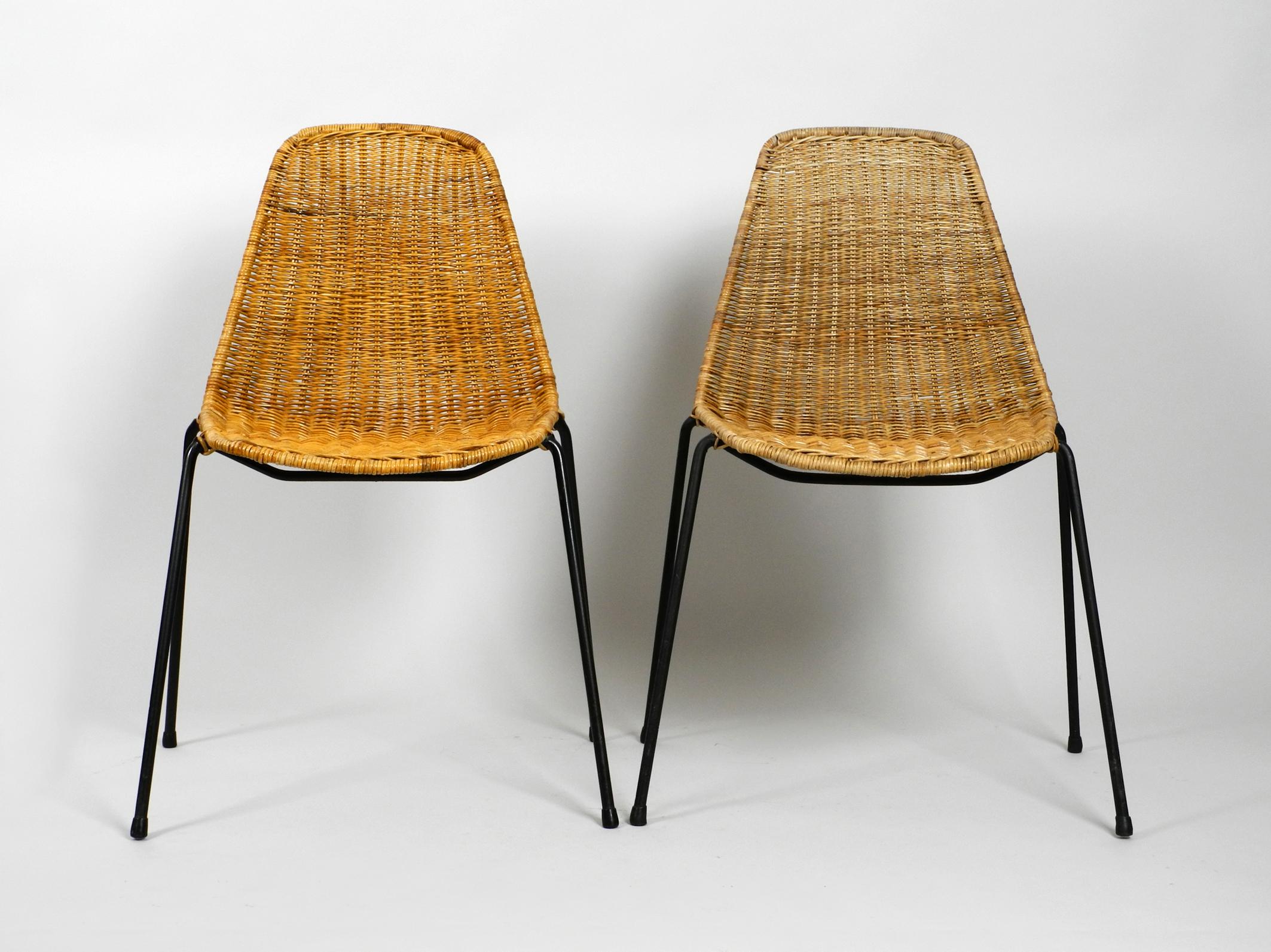 Pair of original Italian Mid-Century Modern Gian Franco Legler 
Basket Chairs in very good vintage condition.
All two chairs are very well preserved and without damages.
One chair is a bit lighter. Looking at the picture the right