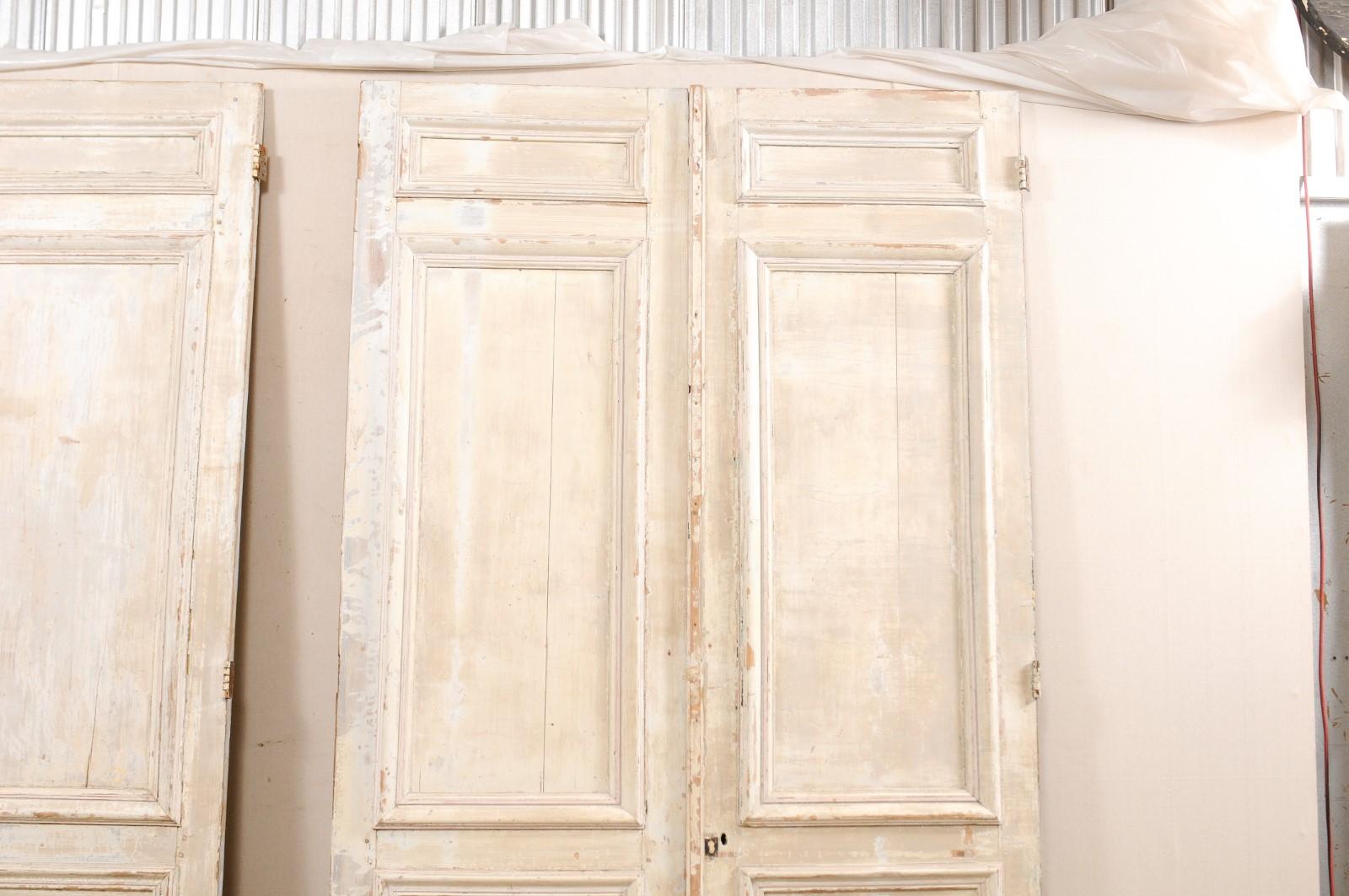 Carved Set of Two Pairs of 19th Century Painted Wood French Paneled Doors, 8.75 Ft Tall