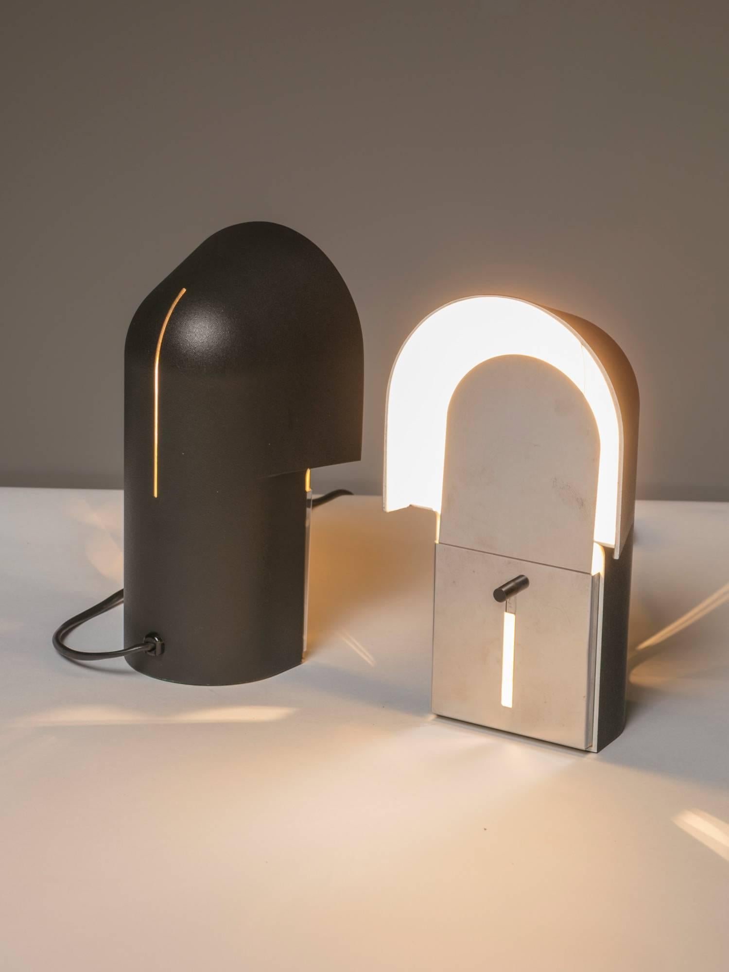 Rare pair of Pala lamps by Corrado and Luigi Aroldi for Luci.
Shade has a steel movable screen to adjust light intensity.
Simple, strong industrial design piece.