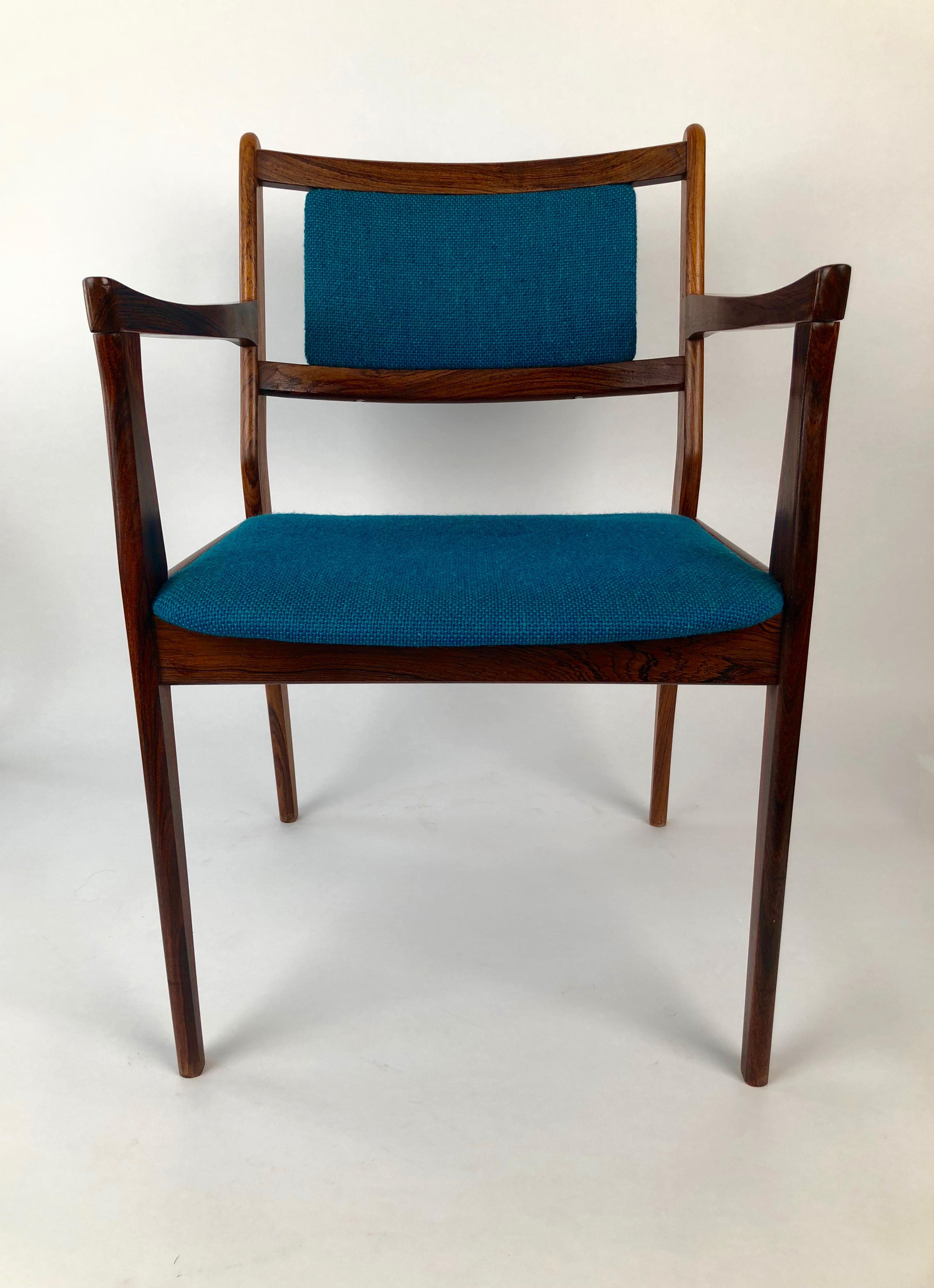 Pair of Palisander armchairs with original turquoise fabric from 1960s.
The chairs are original and in a very good condition.
   