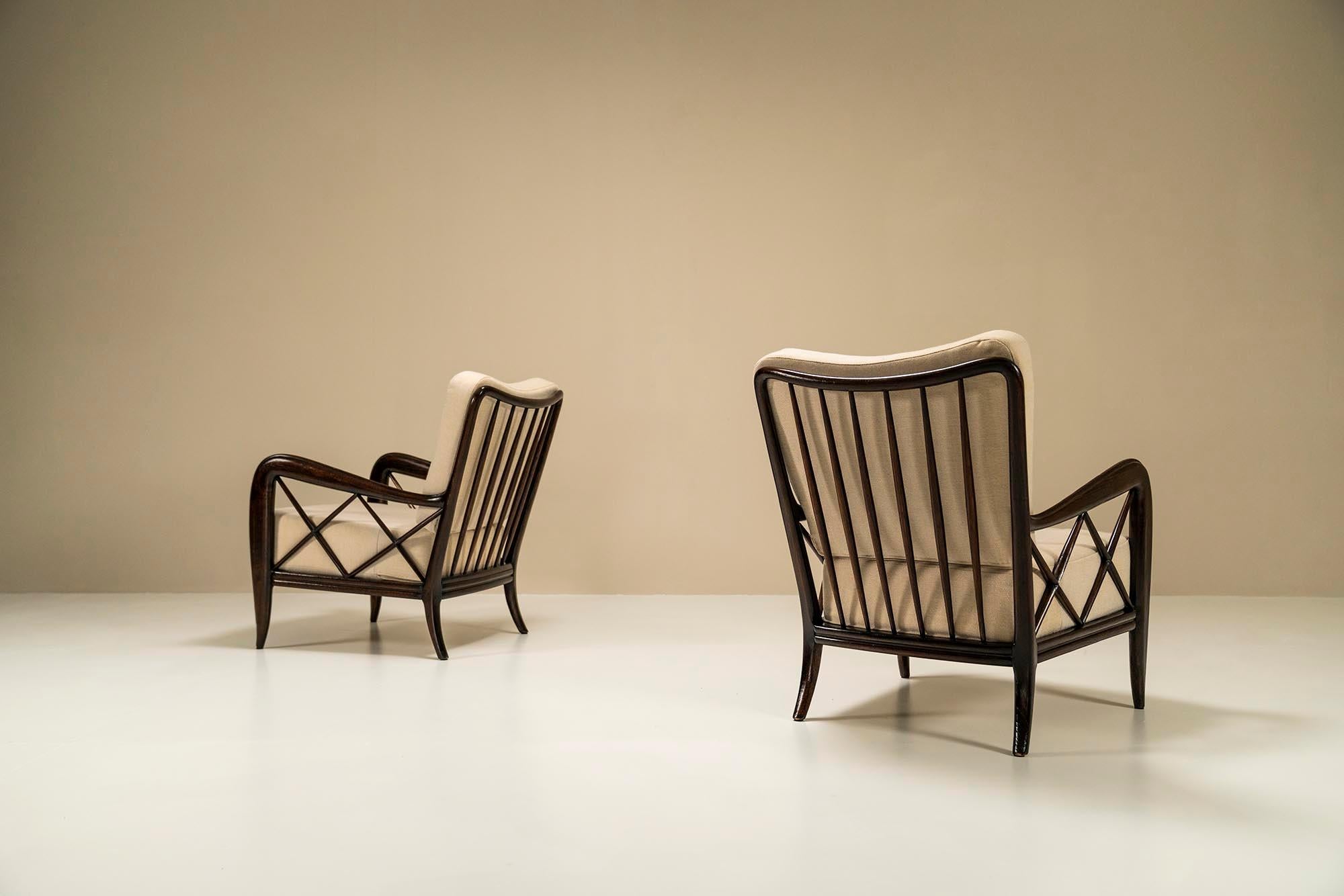 Introducing a timeless masterpiece of furniture design, the exquisite pair of Paulo Buffa Lounge chairs. These chairs embody elegance, comfort, and craftsmanship, making them an exceptional addition to any interior space. With their distinct