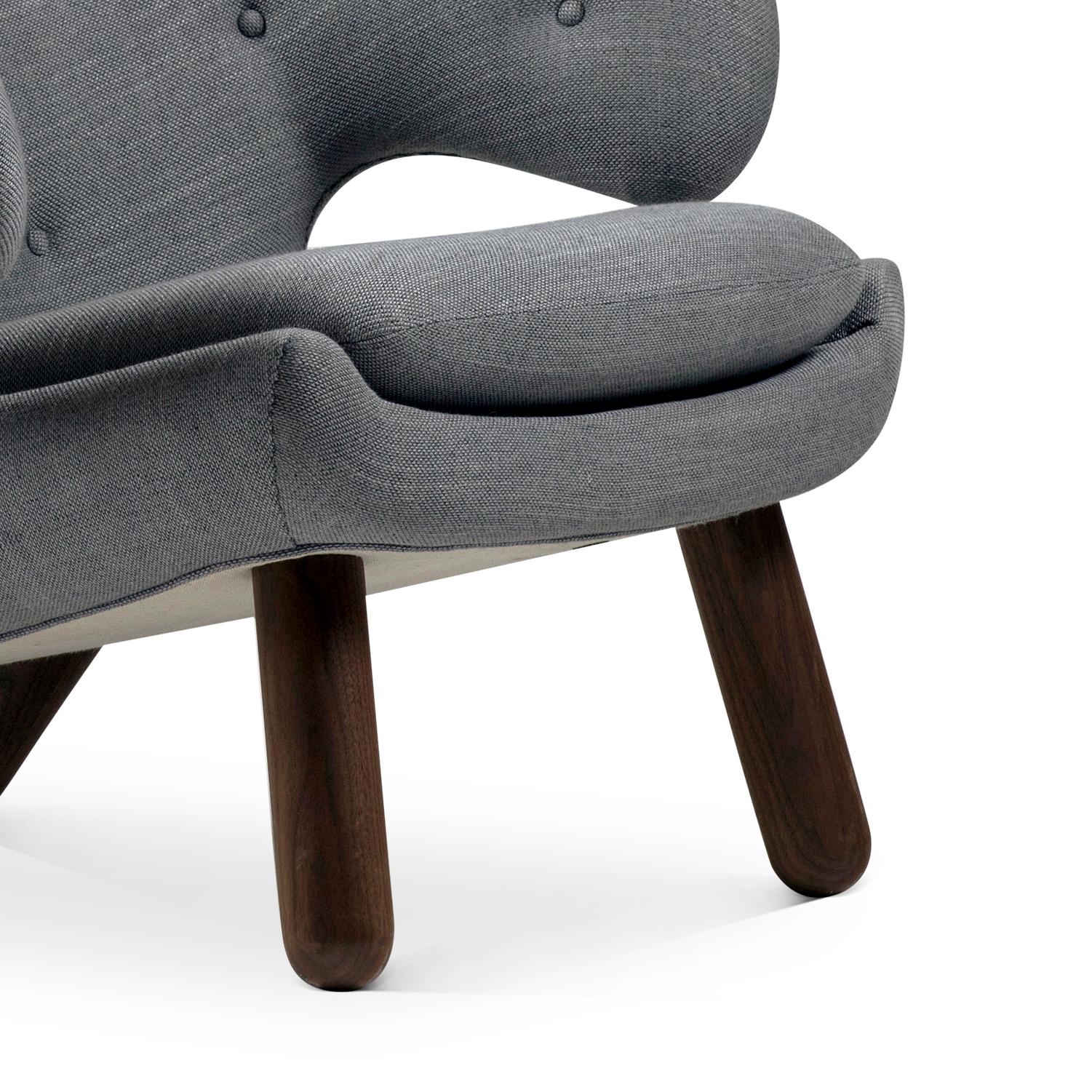 Set of Two Pelican Chairs by Finn Juhl in Fabric and Wood 2
