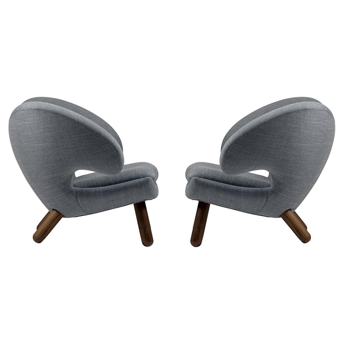 Set of Two Pelican Chairs by Finn Juhl in Fabric and Wood