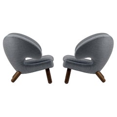 Set of Two Pelican Chairs by Finn Juhl in Fabric and Wood