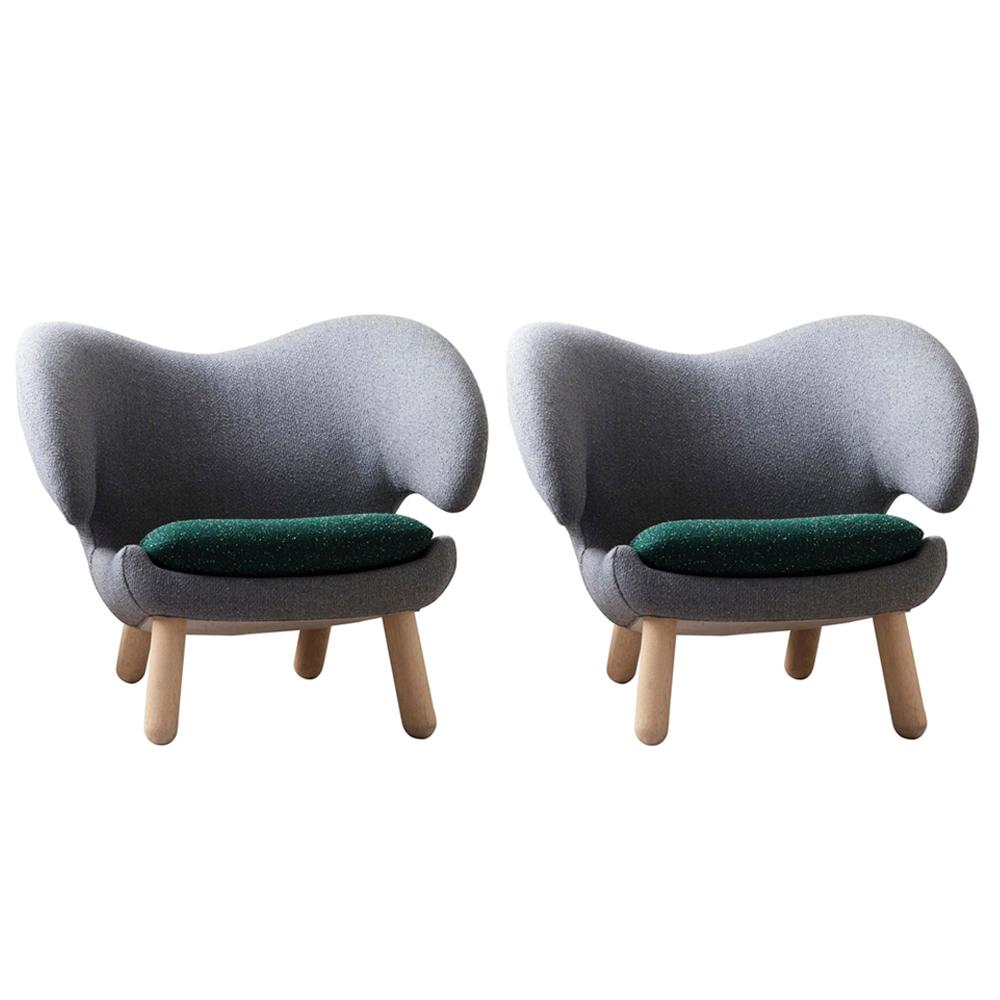 Pelican chairs designed by Finn Juhl in 1940.
Manufactured by House of Finn Juhl in Denmark.

Pelican chair was probably the one furthest ahead of its time. When it was presented at the Copenhagen Cabinetmakers’ Guild Exhibition in 1940, it stood