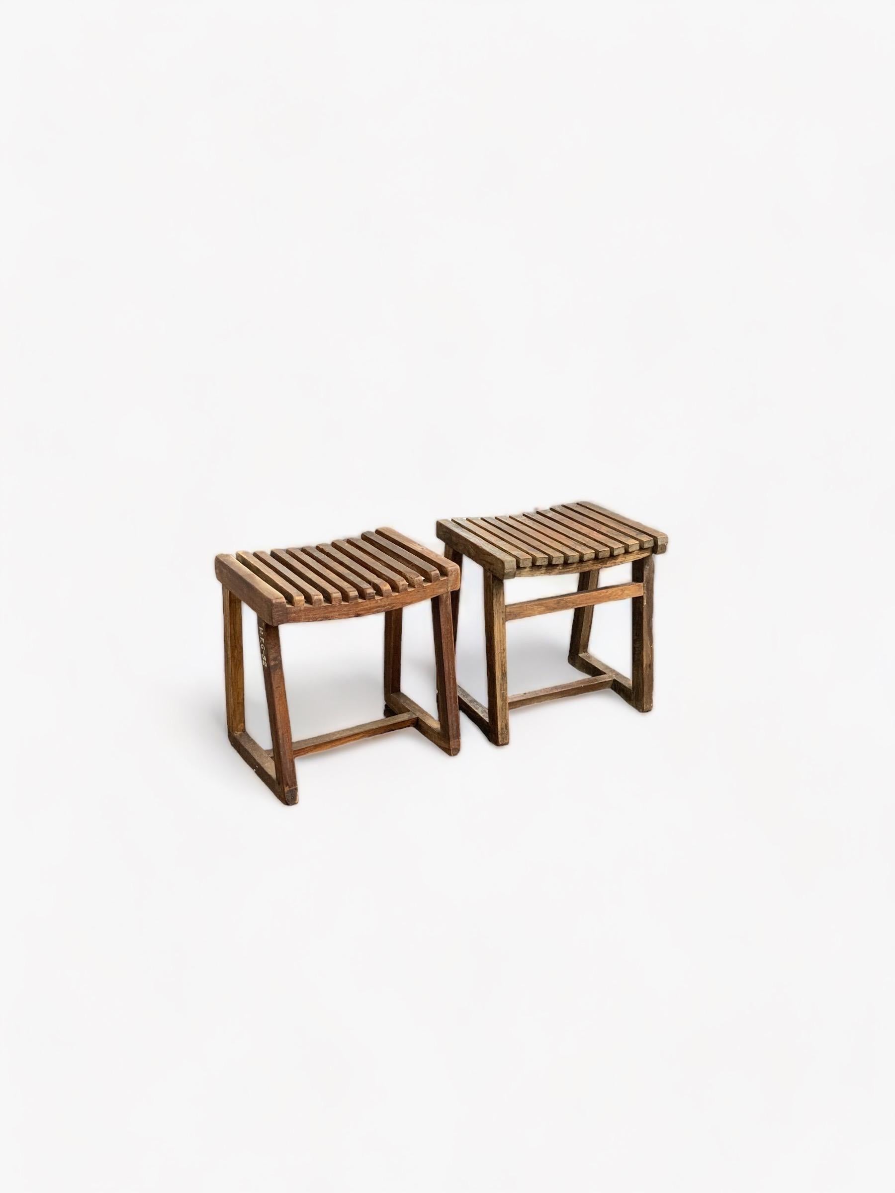 Set of two - Pierre Jeanneret Low Slatted Teak Stools In Good Condition For Sale In New York, NY