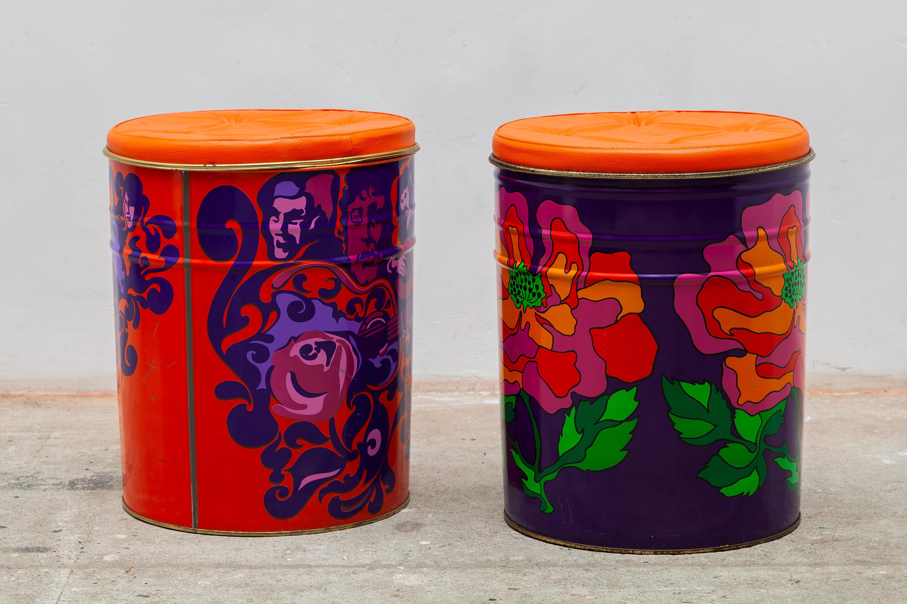 Pop-Art set of metal drum stools, 1960s. Psychedelic imagery, one of rockstars Jimi Hendrix and others, and one with groovy flowers. The tops are upholstered in tufted orange vinyl and can be removed to reveal storage.

Dimensions: 33 W x 42 H x