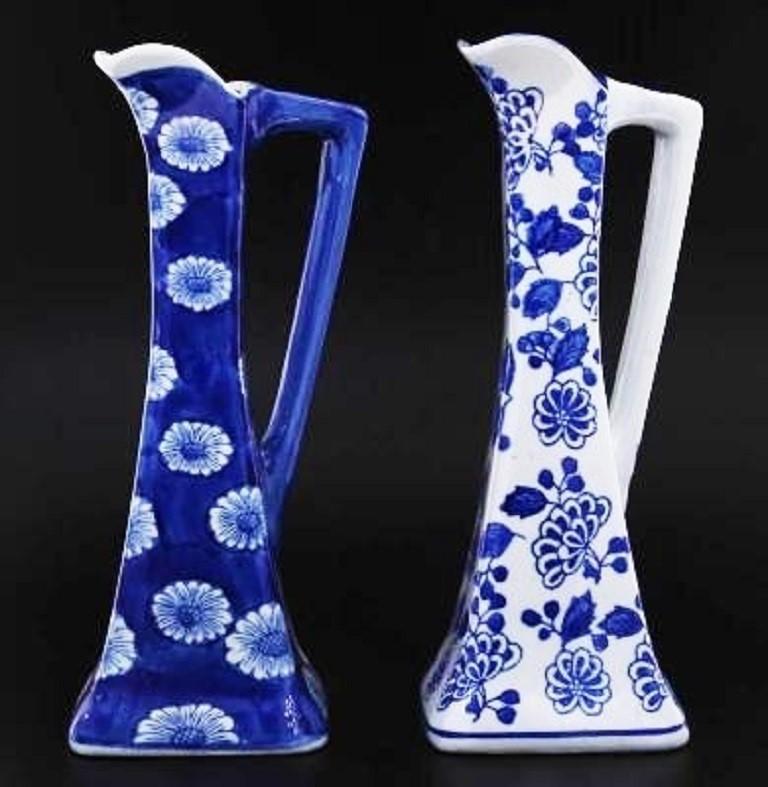 A lovely set of handcraft Portuguese pottery pitchers or jars, hand painted in brilliant blue and glazed, Portugal, circa 1950-1959.
Measures: Height 11.25