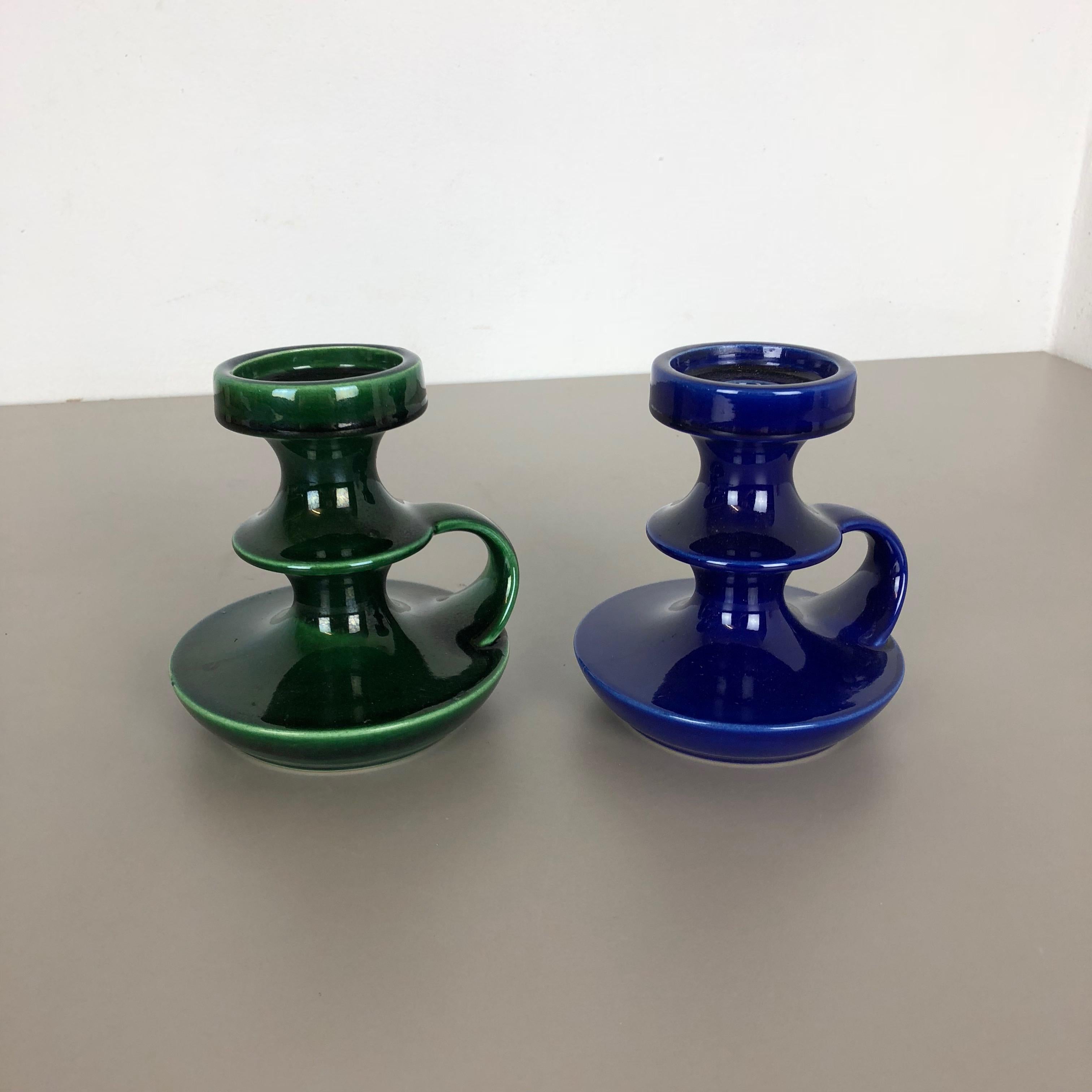Article:

Set of two ceramic candleholder elements

model: 304-15


Producer:

Steuler, Germany


Design:

Cari Zalloni



Decade:

1970s


Description:

These original vintage candleholder was produced in the 1970s in