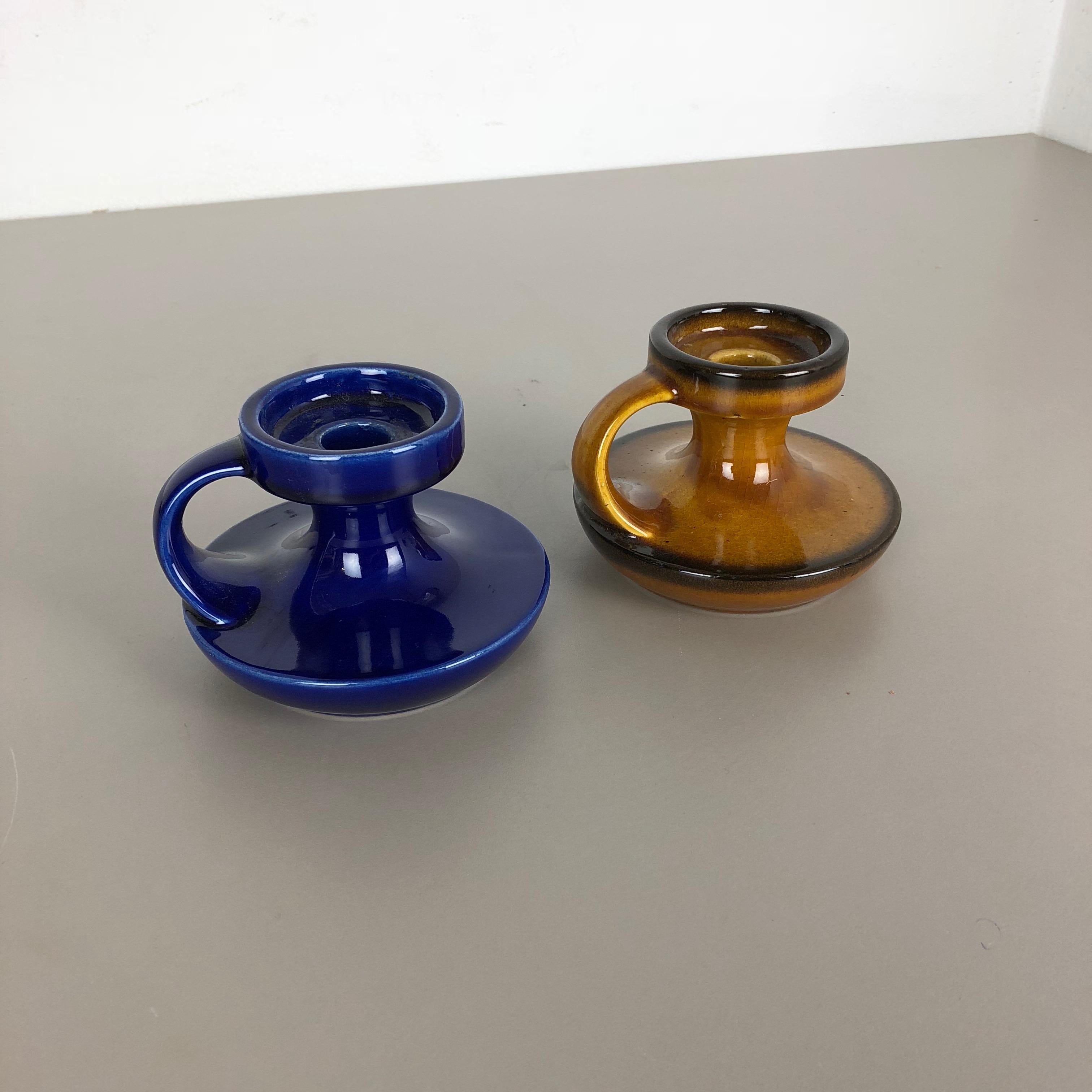 Article:

Set of two ceramic candleholder elements

Model: 303-10


Producer:

Steuler, Germany


Design:

Cari Zalloni



Decade:

1970s


Description:

These original vintage candleholder was produced in the 1970s in
