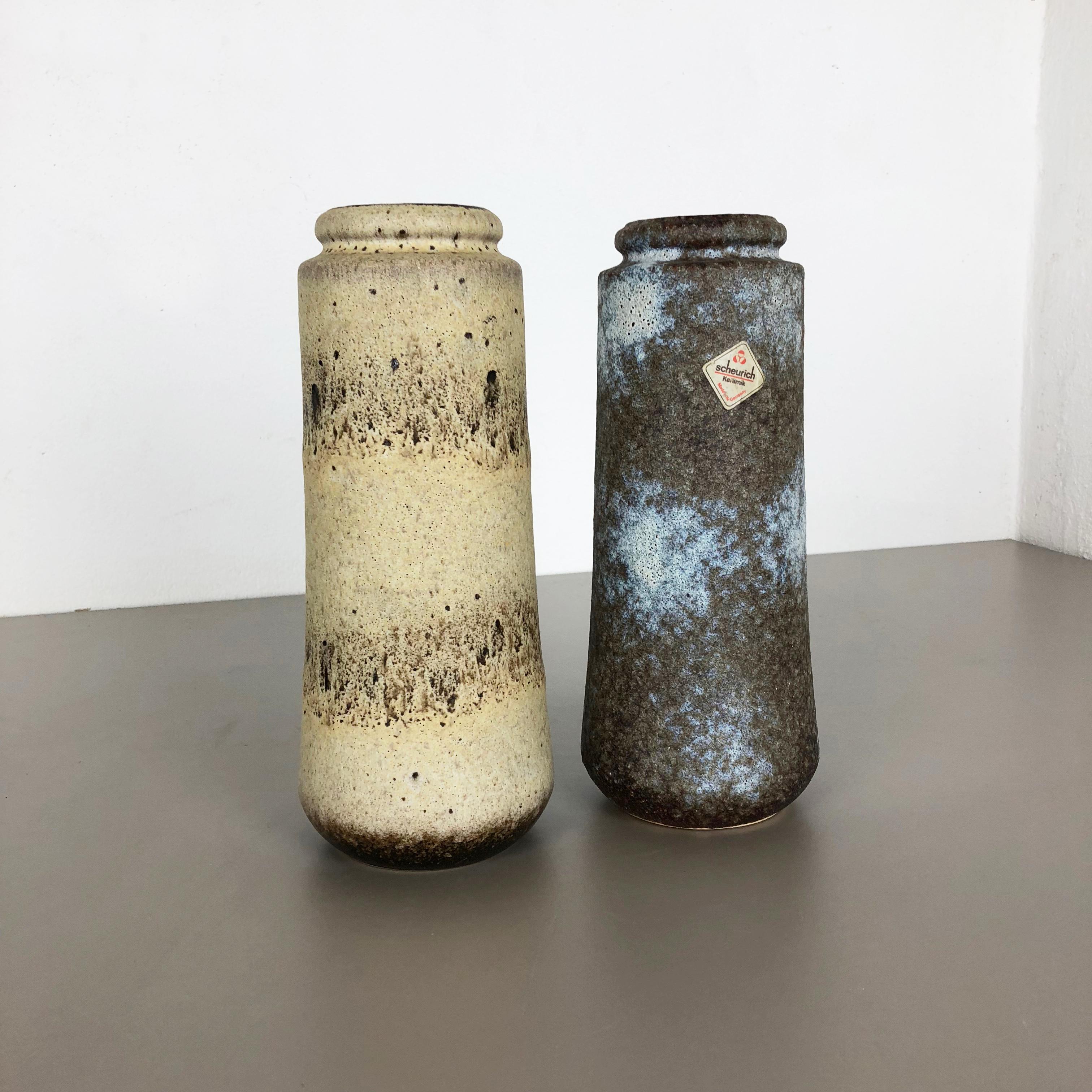 Article:

Set of two fat lava art vases

Model: 206-26


Producer:

Scheurich, Germany



Decade:

1970s


Description:

These original vintage vases was produced in the 1970s in Germany. It is made of ceramic pottery in fat lava