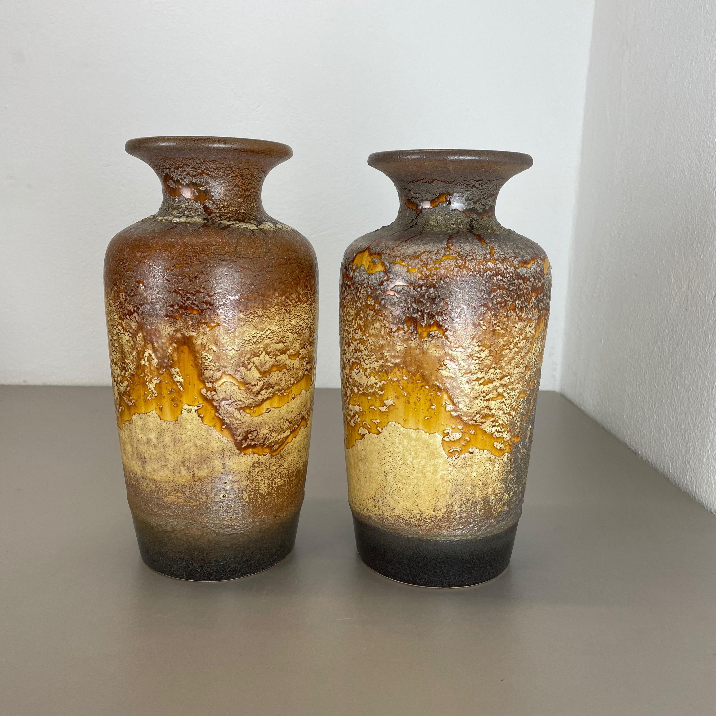Article:

Set of two fat lava art vases.


Producer:

Scheurich, Germany



Decade:

1970s




These original vintage vases was produced in the 1970s in Germany. It is made of ceramic pottery in fat lava optic. Super rare in this