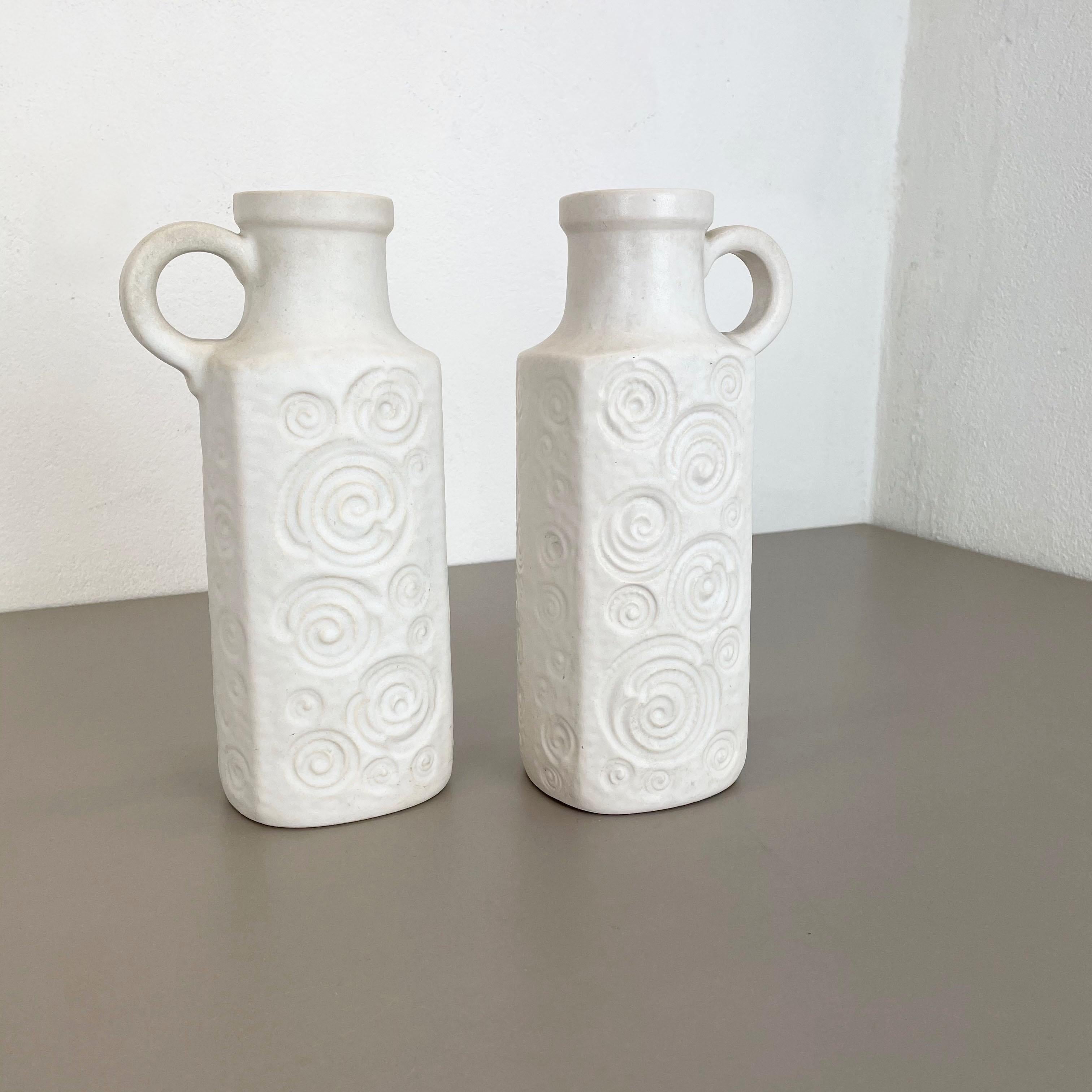 Article:

Set of two fat lava art vases

model: Jura 482-28


Producer:

Scheurich, Germany



Decade:

1970s


Description:

These original vintage vases was produced in the 1970s in Germany. It is made of ceramic pottery in fat