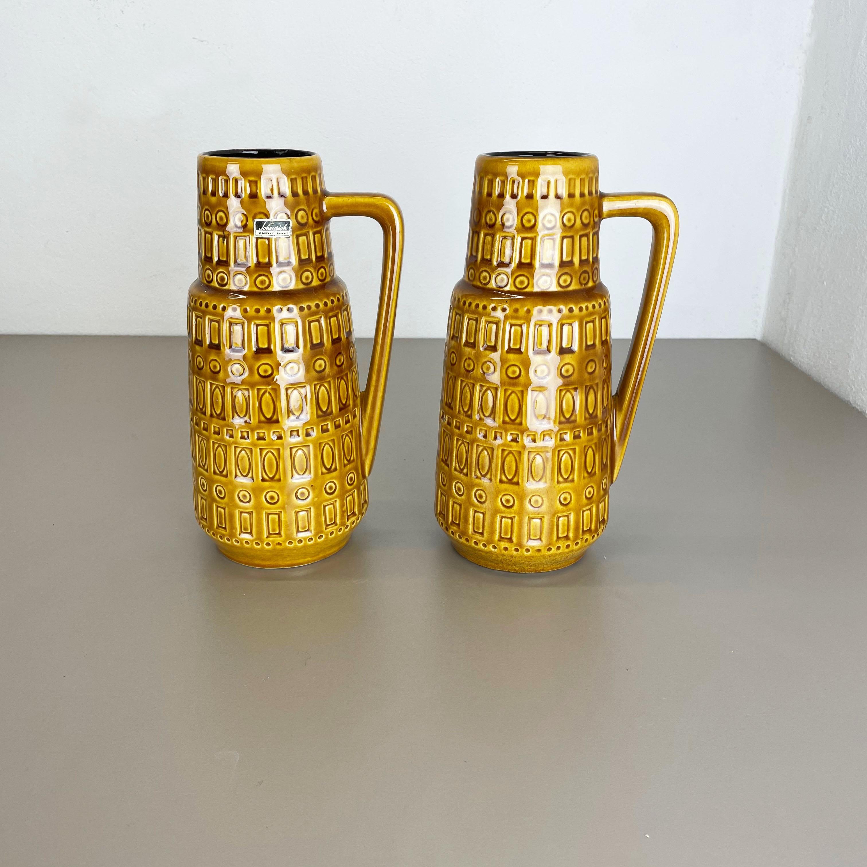 Article:

Set of two fat lava art vases


Producer:

Scheurich, Germany



Decade:

1970s




These original vintage vases was produced in the 1970s in Germany. It is made of ceramic pottery in fat lava optic. Super rare in this