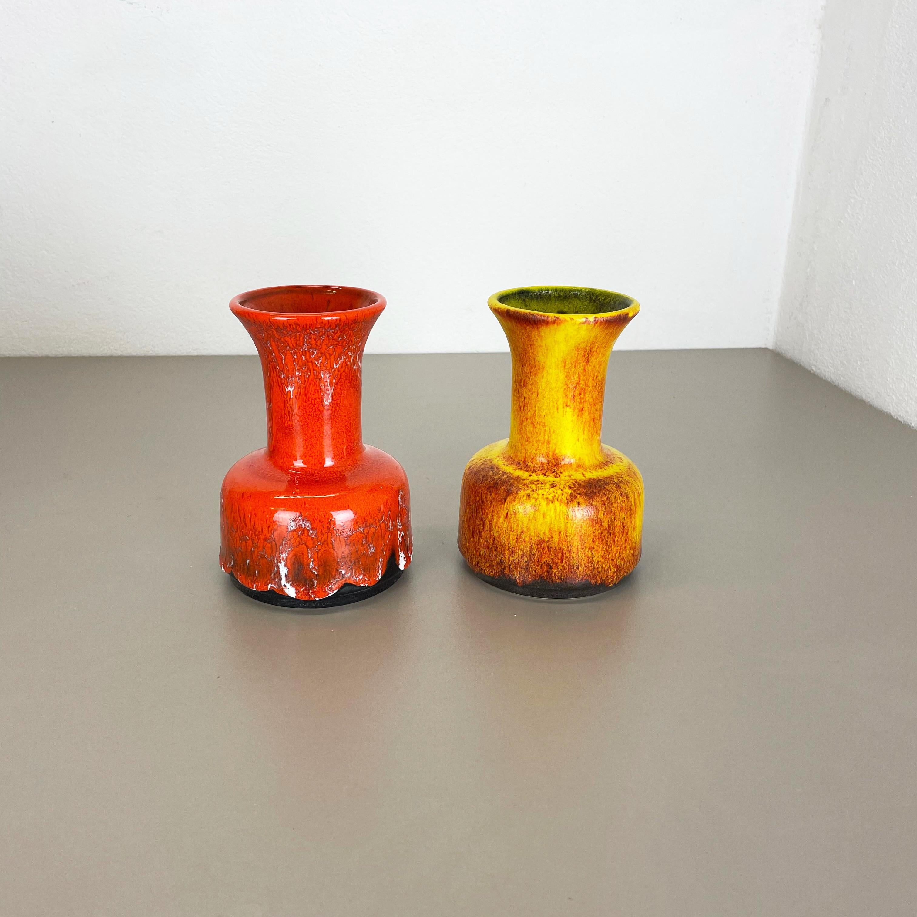 Article:

Set of two fat lava art vases


Producer:

Jasba Ceramics, Germany



Decade:

1970s




These original vintage vases was produced in the 1970s in Germany. It is made of ceramic pottery in fat lava optic. Super rare in