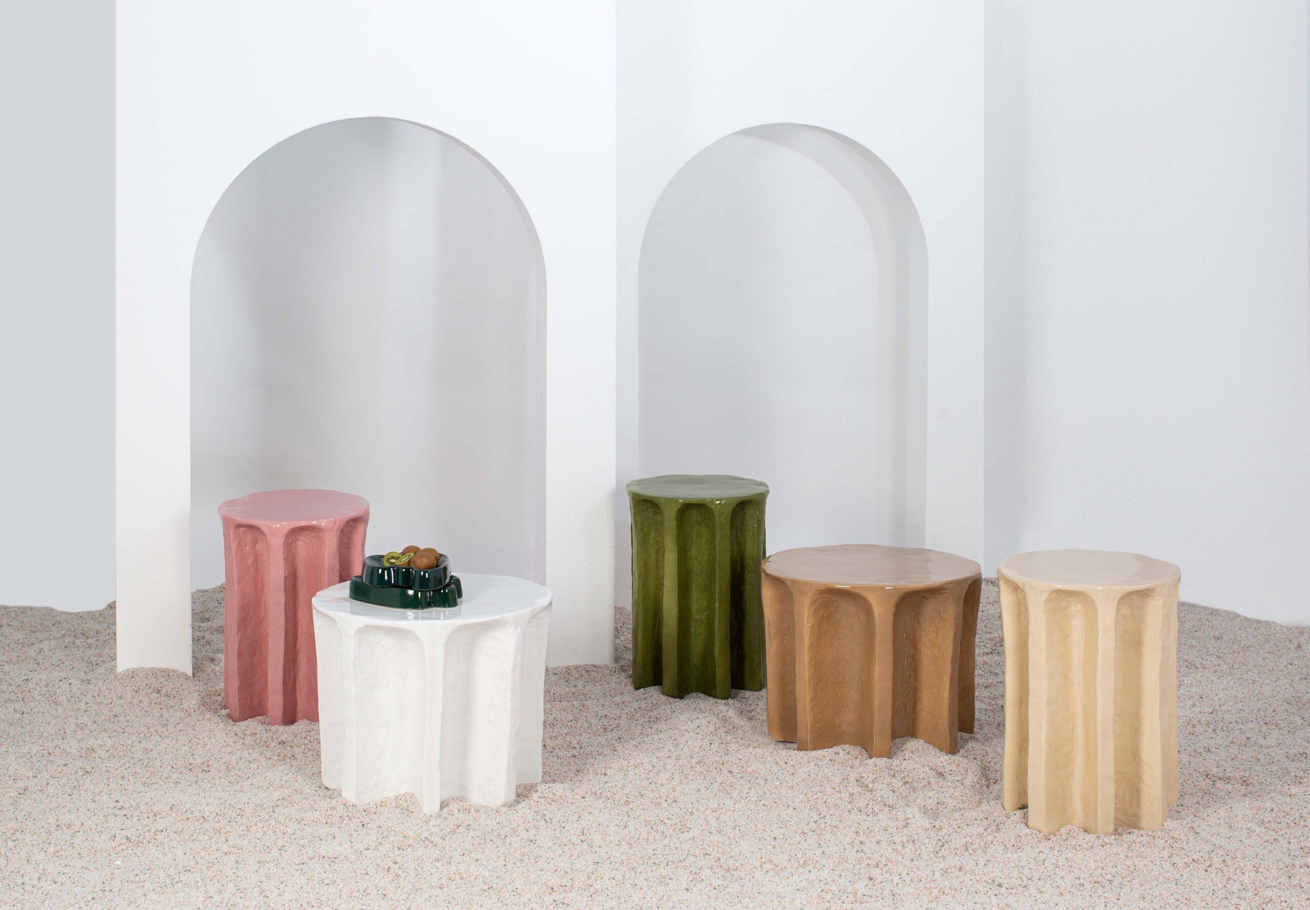 Making a sculptural centerpiece in your interior, the chouchou round big coffee table features all the hallmarks of its family members. Roughly shaped arches surround its exterior, with an option of mottled or gloss-glazed ceramic defining each