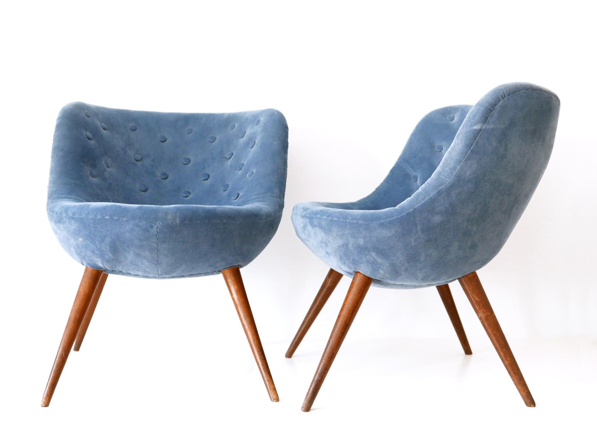 Set of two extremely rare and lovely Mid-Century Modern lounge easy chairs. Designed by Fritz Neth (attributed) for Correcta, Germany, 1950s.

The chairs are reupholstered by the previous owner.
It is up to the buyer whether he/she takes another