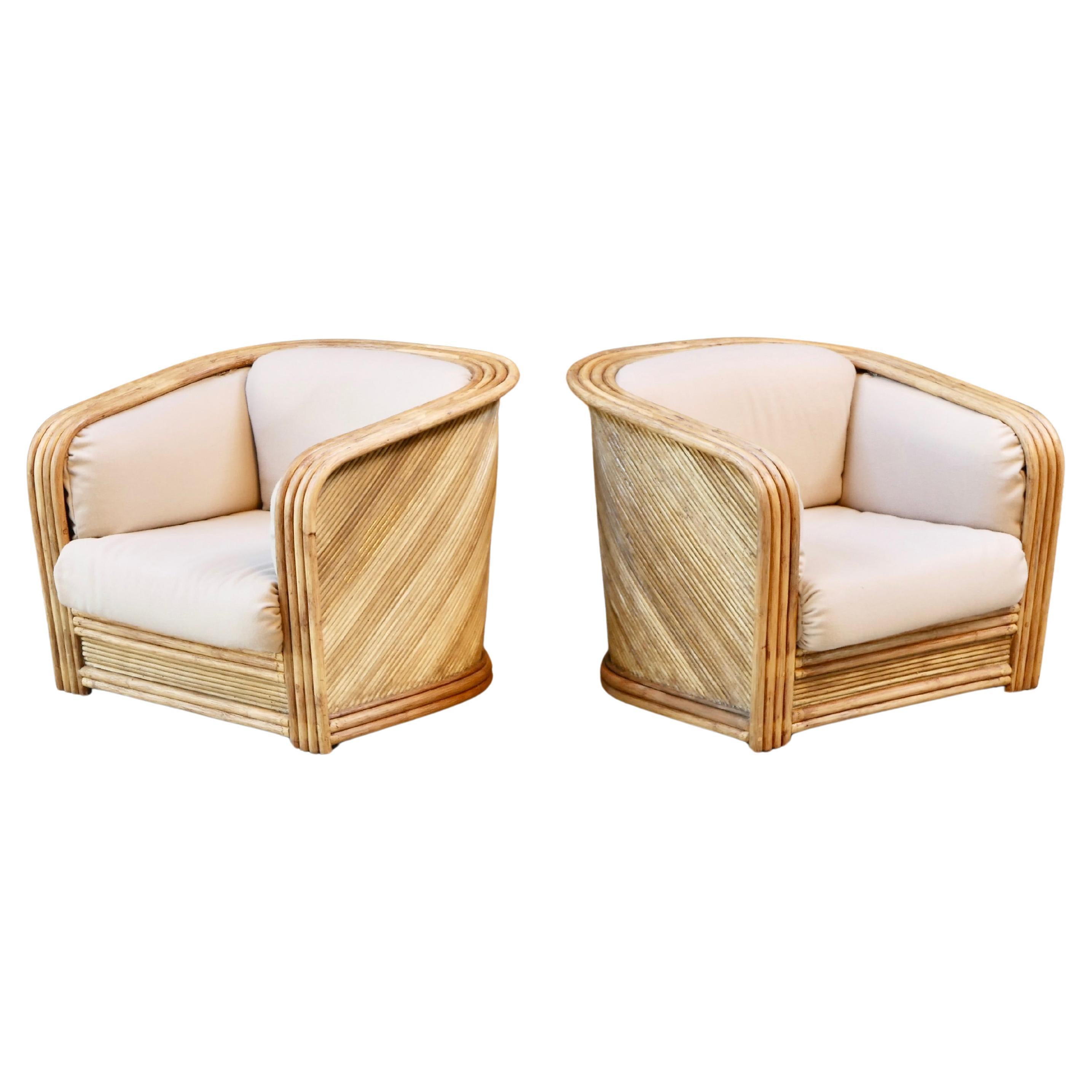Gorgeous and very rare to find set of two rattan armchairs from the 1980s, made in France by Maugrion 