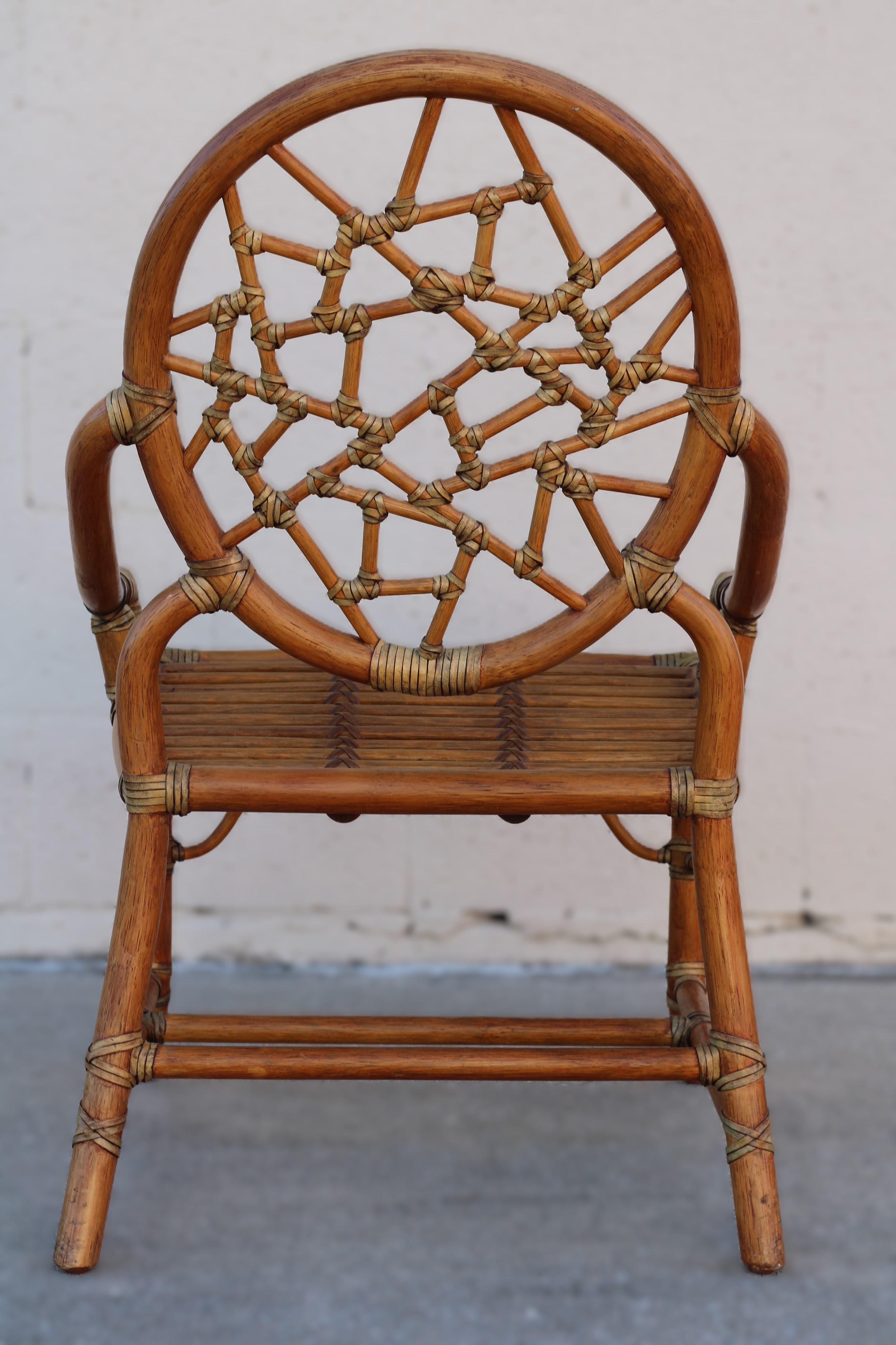 Pair of Rattan Cracked Ice Style Arm Chairs with Rolling Ottoman For Sale 6
