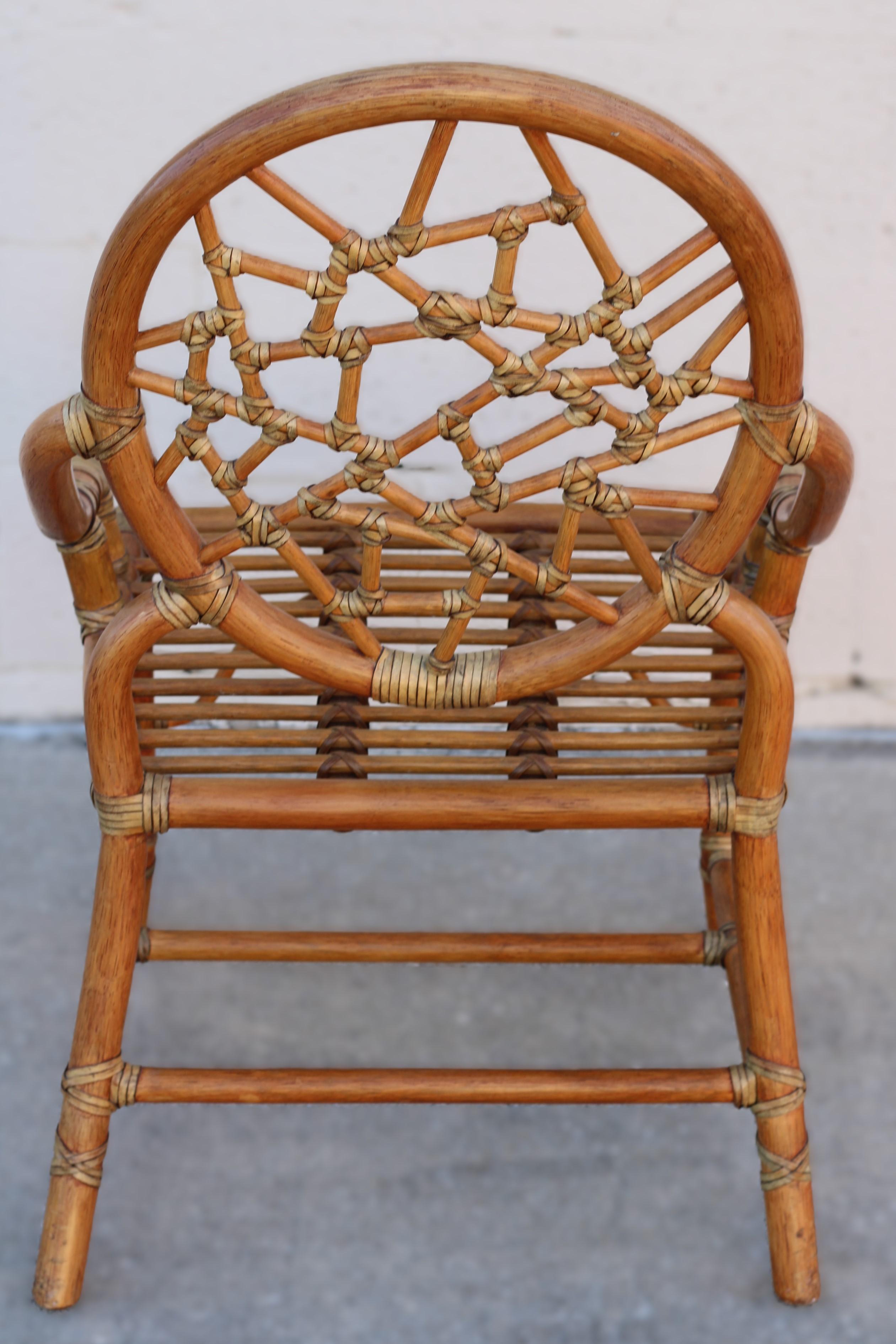 Pair of Rattan Cracked Ice Style Arm Chairs with Rolling Ottoman For Sale 8