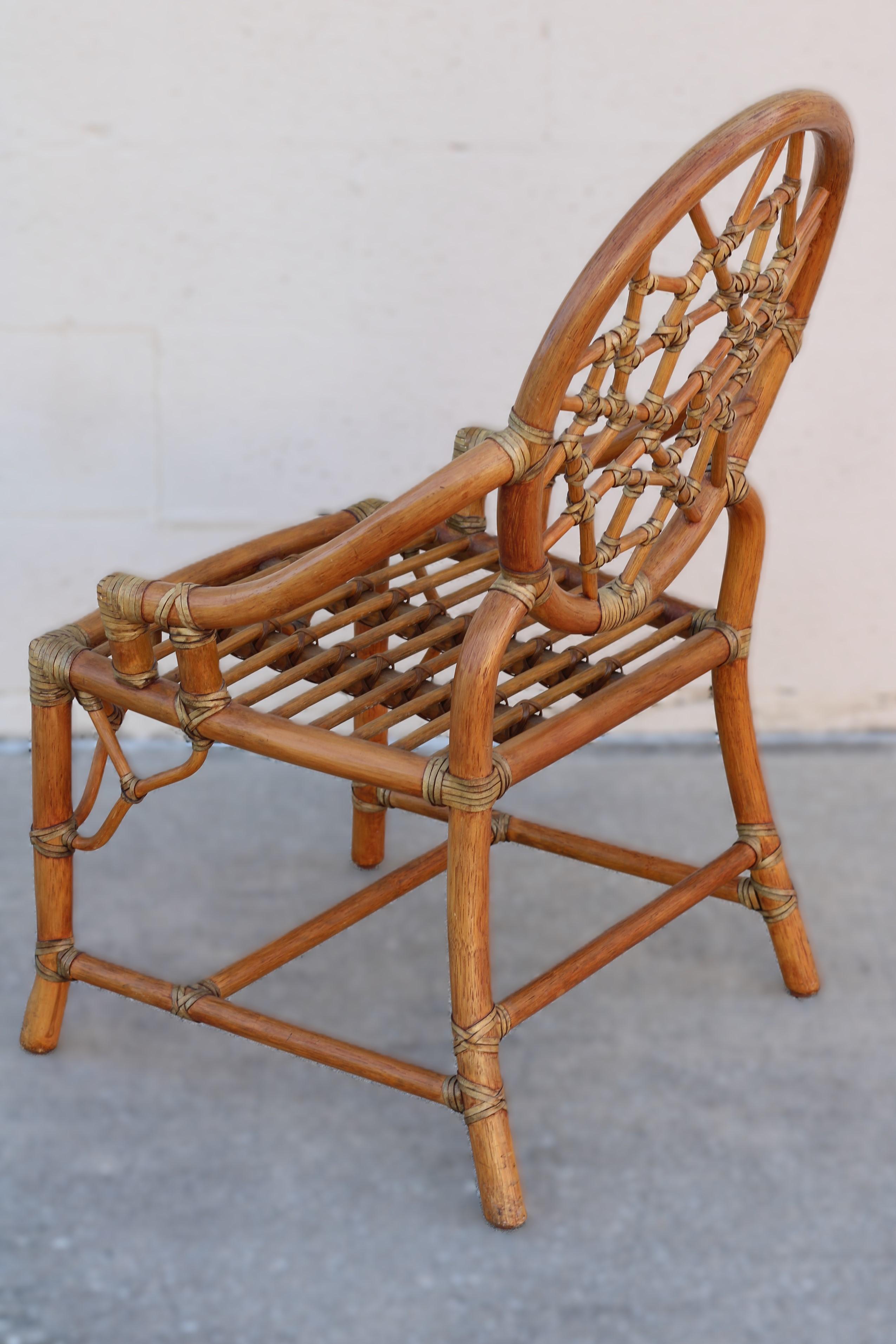 Pair of Rattan Cracked Ice Style Arm Chairs with Rolling Ottoman For Sale 9