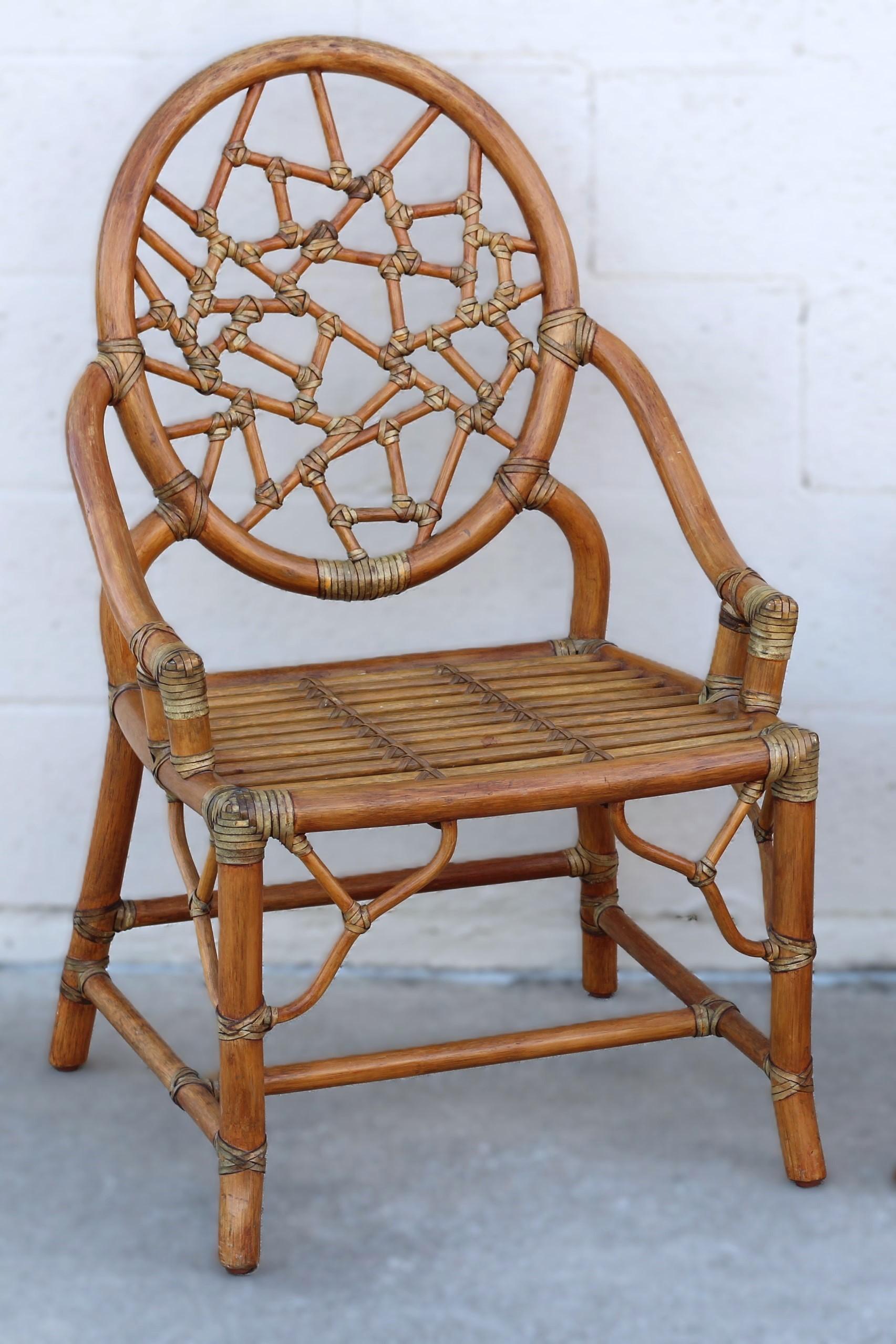 Hand-Crafted Pair of Rattan Cracked Ice Style Arm Chairs with Rolling Ottoman For Sale