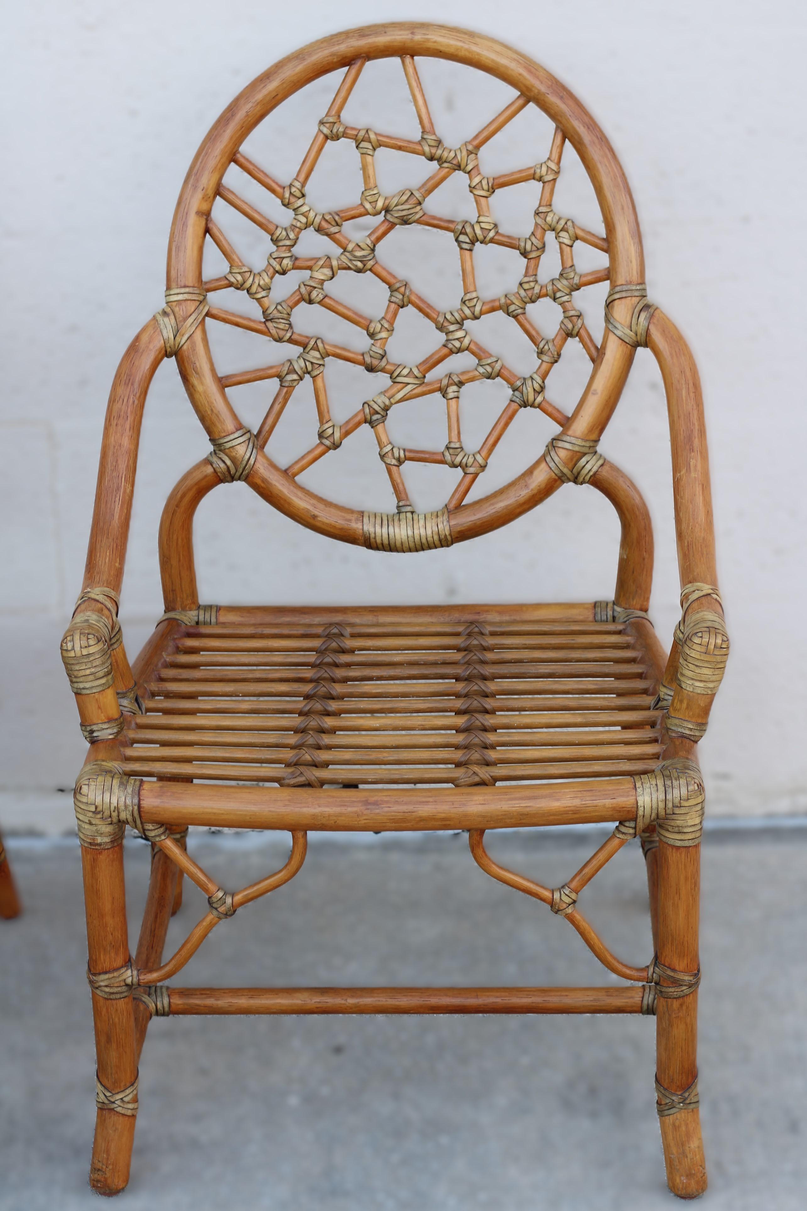 Leather Pair of Rattan Cracked Ice Style Arm Chairs with Rolling Ottoman For Sale